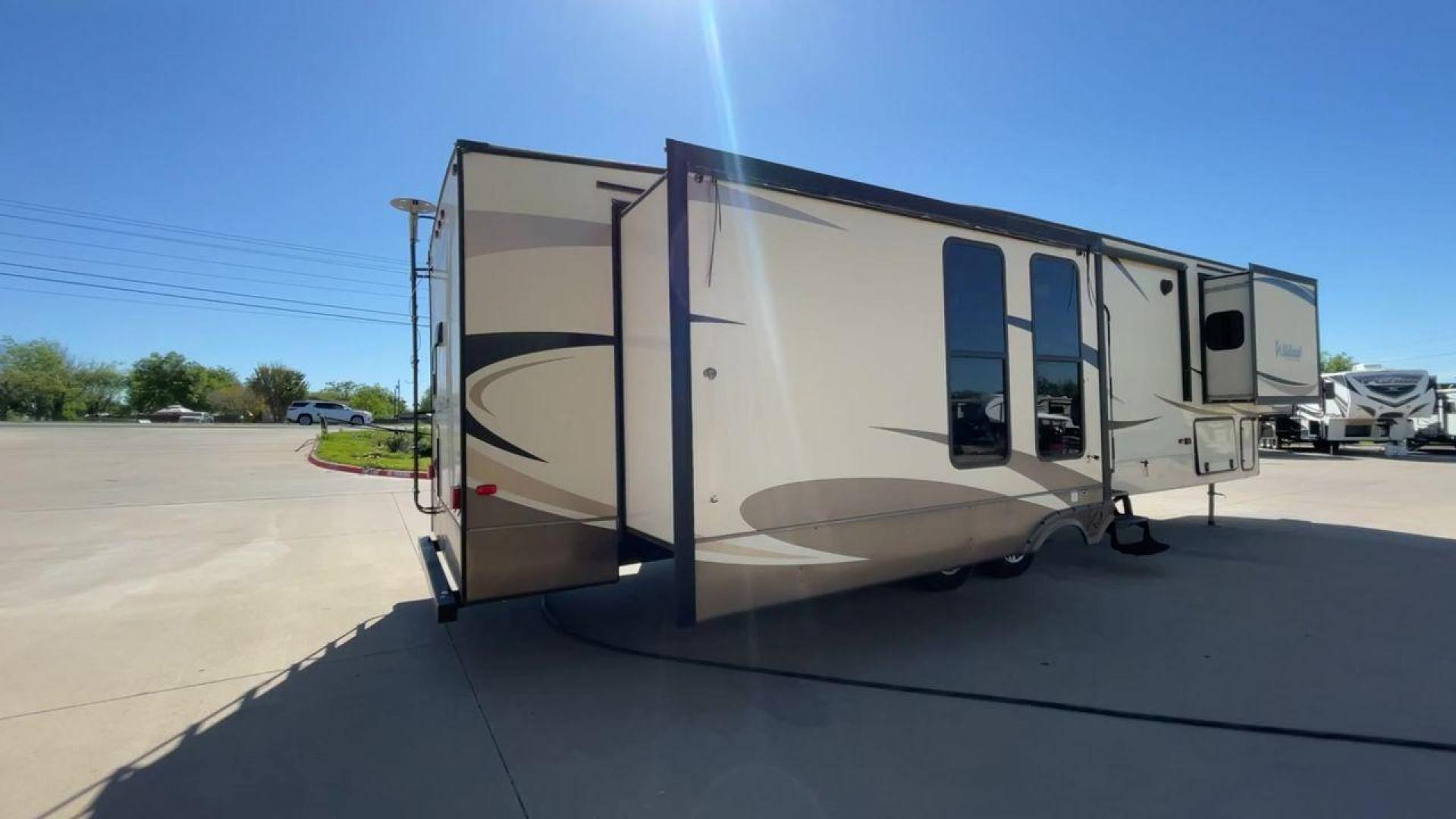 2018 TAN FOREST RIVER WILDCAT 37WB (5ZT3WC2BXJG) , located at 4319 N Main Street, Cleburne, TX, 76033, (817) 221-0660, 32.435829, -97.384178 - Photo#1