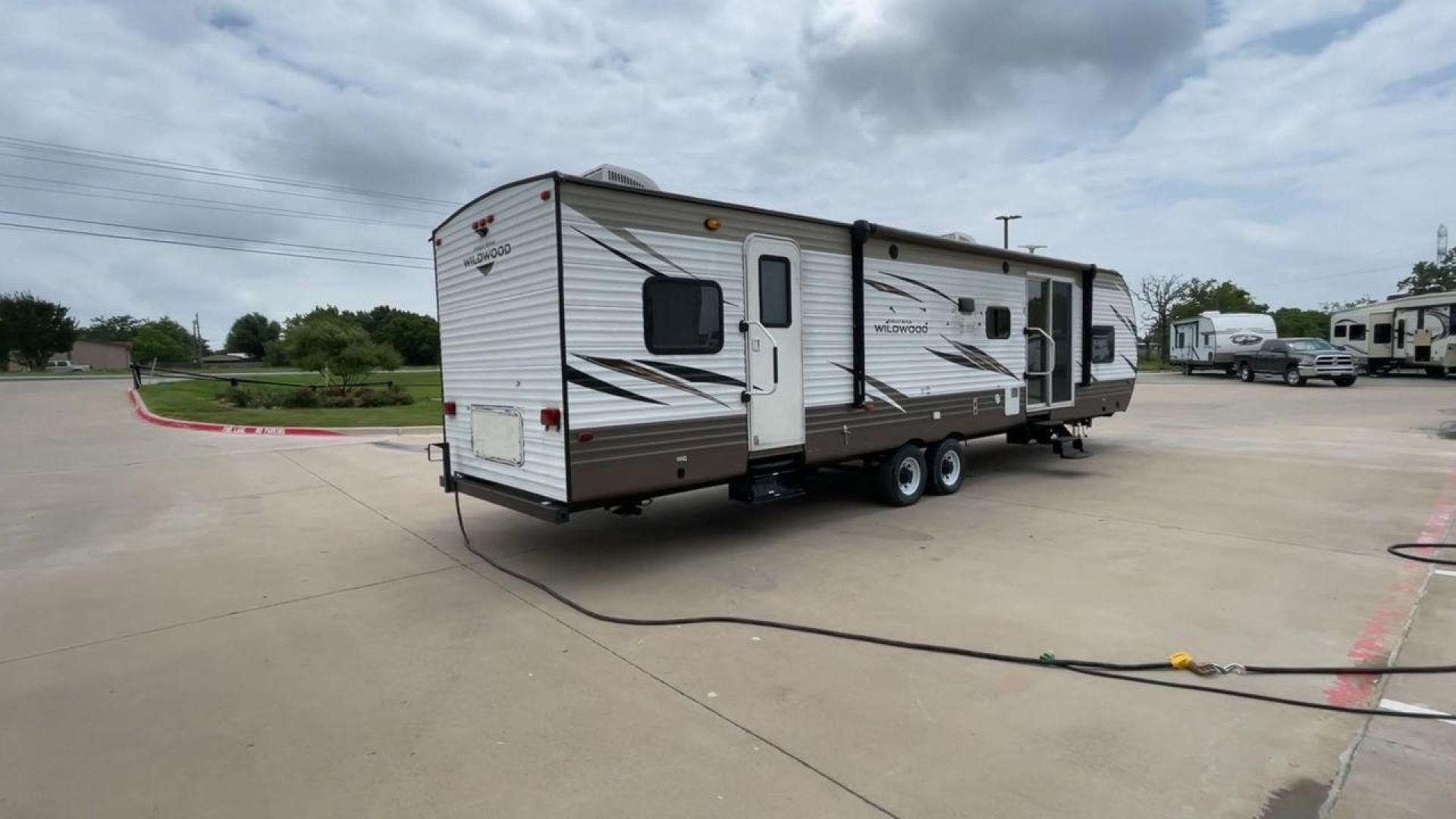 2018 FOREST RIVER WILDWOOD 36BHBS (4X4TWDM27J8) , located at 4319 N Main Street, Cleburne, TX, 76033, (817) 221-0660, 32.435829, -97.384178 - Photo#1