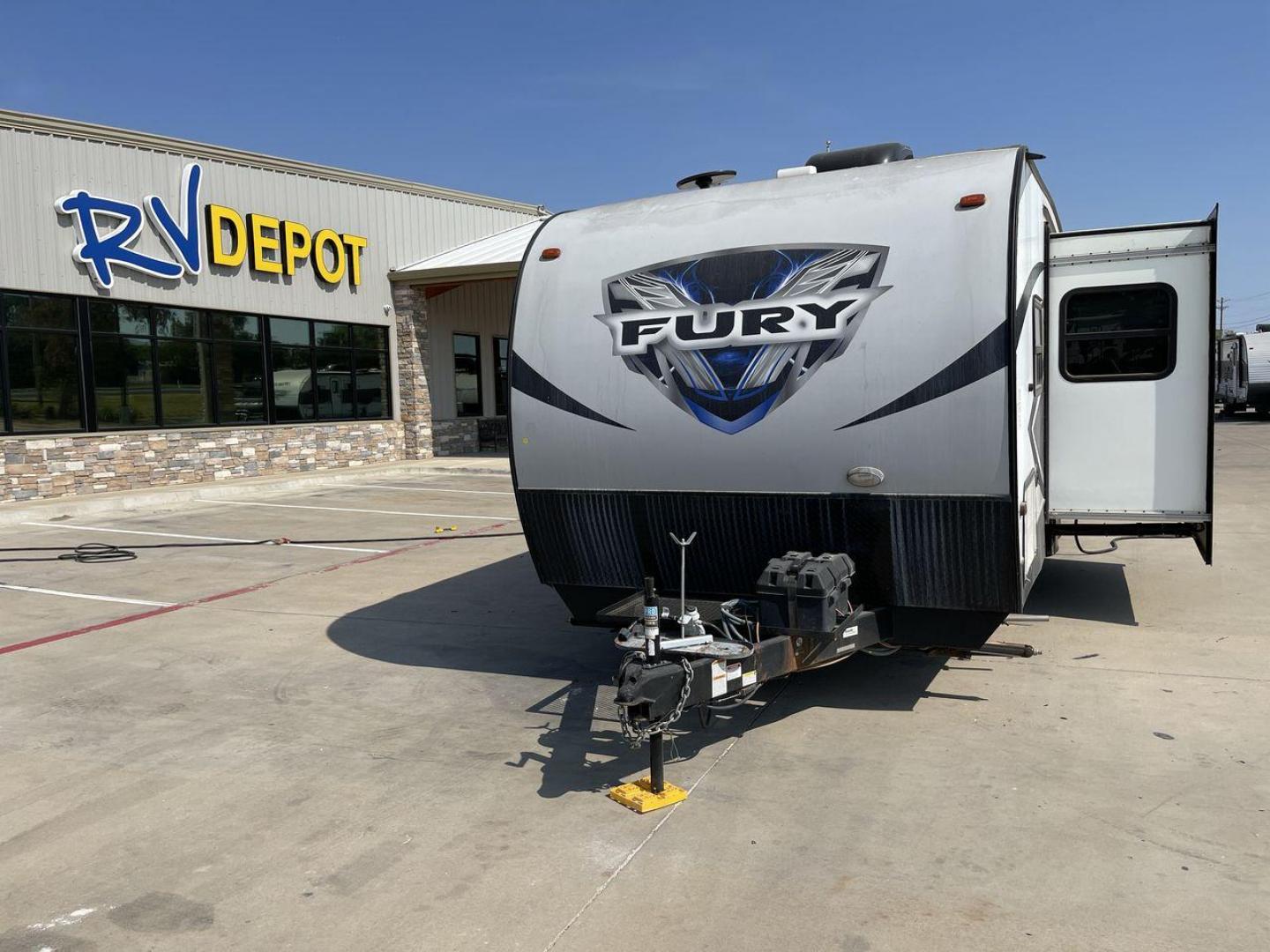 2018 GRAY HEARTLAND FURY 2910 (5ZT2FHUB2JG) , Length: 34.5 ft. | Dry Weight: 7,262 lbs. | Slides: 1 transmission, located at 4319 N Main Street, Cleburne, TX, 76033, (817) 221-0660, 32.435829, -97.384178 - The 2018 Prime Time Fury 2910 is a rugged and versatile toy hauler that seamlessly blends functionality with comfort for the ultimate adventure on the road. Measuring 34.5 feet in length, this toy hauler boasts an innovative design catered to the needs of outdoor enthusiasts. The Fury 2910 features - Photo#0