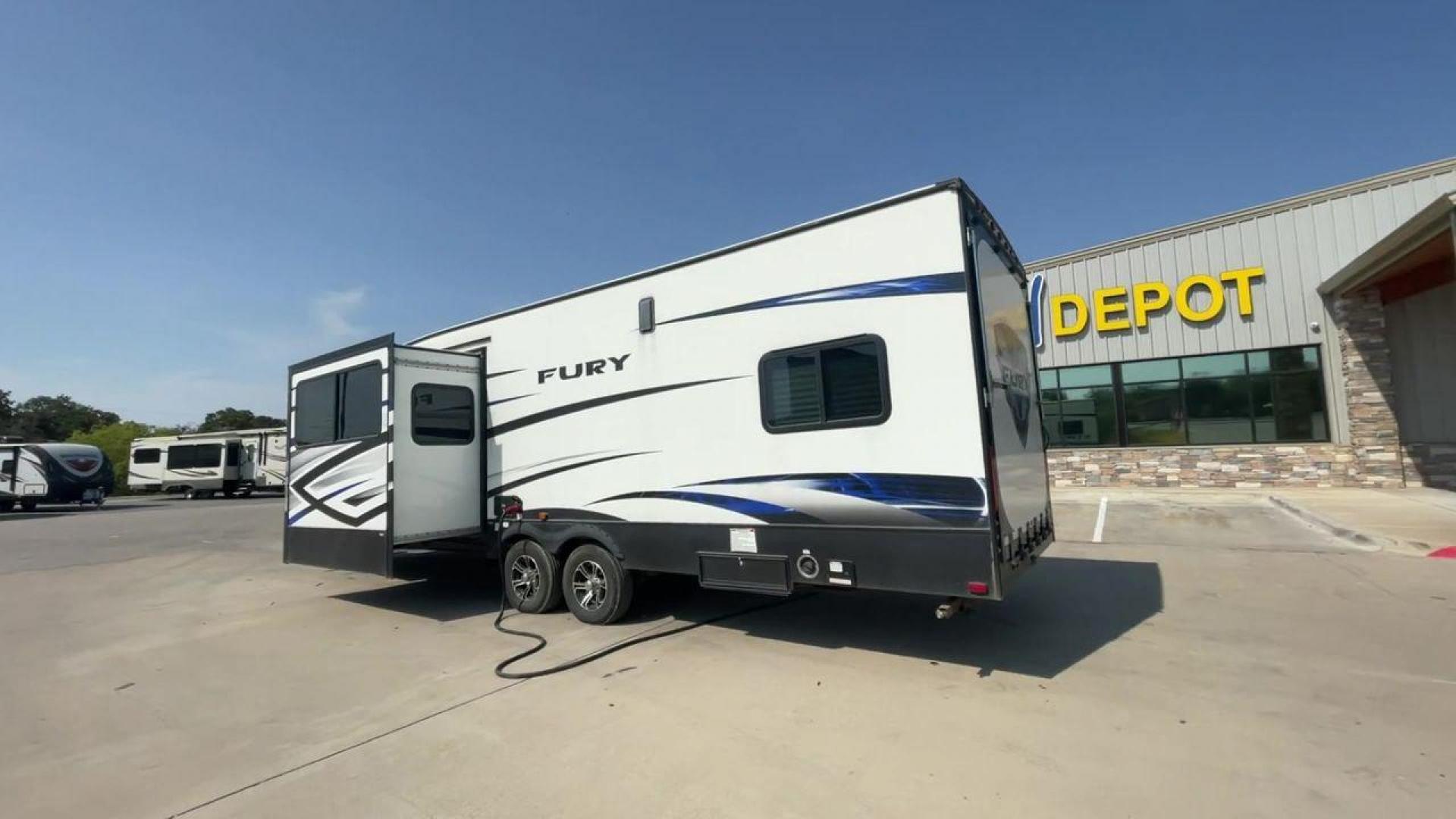 2018 GRAY HEARTLAND FURY 2910 (5ZT2FHUB2JG) , Length: 34.5 ft. | Dry Weight: 7,262 lbs. | Slides: 1 transmission, located at 4319 N Main Street, Cleburne, TX, 76033, (817) 221-0660, 32.435829, -97.384178 - The 2018 Prime Time Fury 2910 is a rugged and versatile toy hauler that seamlessly blends functionality with comfort for the ultimate adventure on the road. Measuring 34.5 feet in length, this toy hauler boasts an innovative design catered to the needs of outdoor enthusiasts. The Fury 2910 features - Photo#1