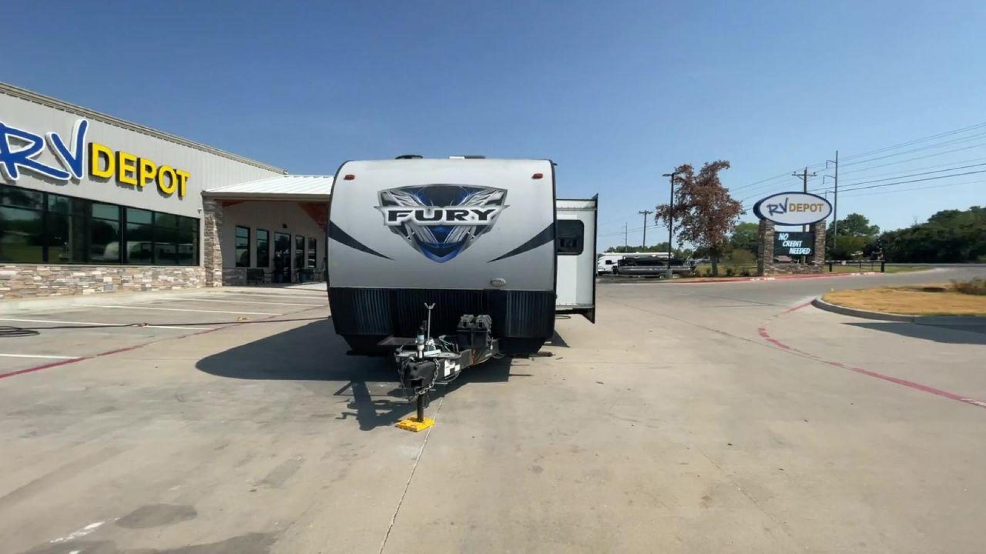 2018 GRAY HEARTLAND FURY 2910 (5ZT2FHUB2JG) , Length: 34.5 ft. | Dry Weight: 7,262 lbs. | Slides: 1 transmission, located at 4319 N Main Street, Cleburne, TX, 76033, (817) 221-0660, 32.435829, -97.384178 - The 2018 Prime Time Fury 2910 is a rugged and versatile toy hauler that seamlessly blends functionality with comfort for the ultimate adventure on the road. Measuring 34.5 feet in length, this toy hauler boasts an innovative design catered to the needs of outdoor enthusiasts. The Fury 2910 features - Photo#4