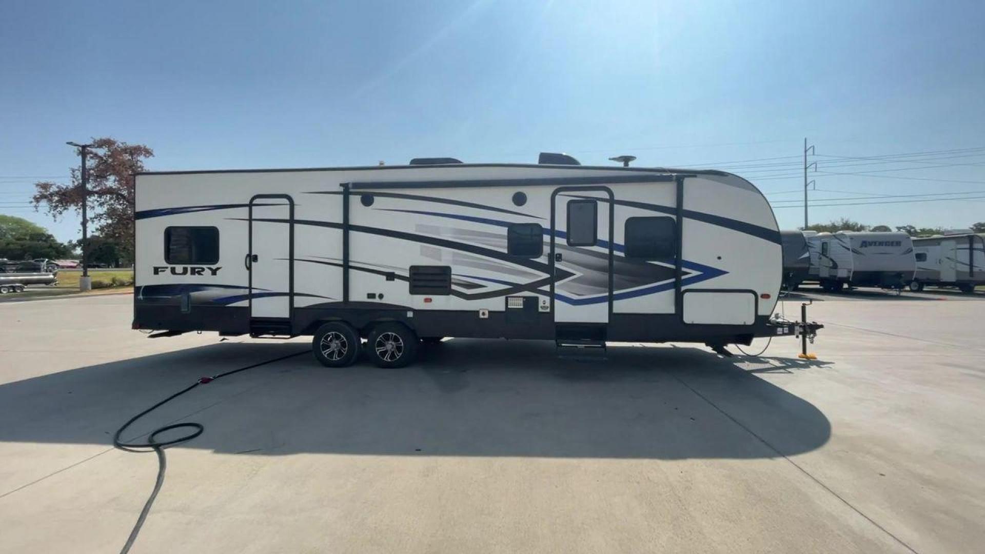 2018 GRAY HEARTLAND FURY 2910 (5ZT2FHUB2JG) , Length: 34.5 ft. | Dry Weight: 7,262 lbs. | Slides: 1 transmission, located at 4319 N Main Street, Cleburne, TX, 76033, (817) 221-0660, 32.435829, -97.384178 - The 2018 Prime Time Fury 2910 is a rugged and versatile toy hauler that seamlessly blends functionality with comfort for the ultimate adventure on the road. Measuring 34.5 feet in length, this toy hauler boasts an innovative design catered to the needs of outdoor enthusiasts. The Fury 2910 features - Photo#6