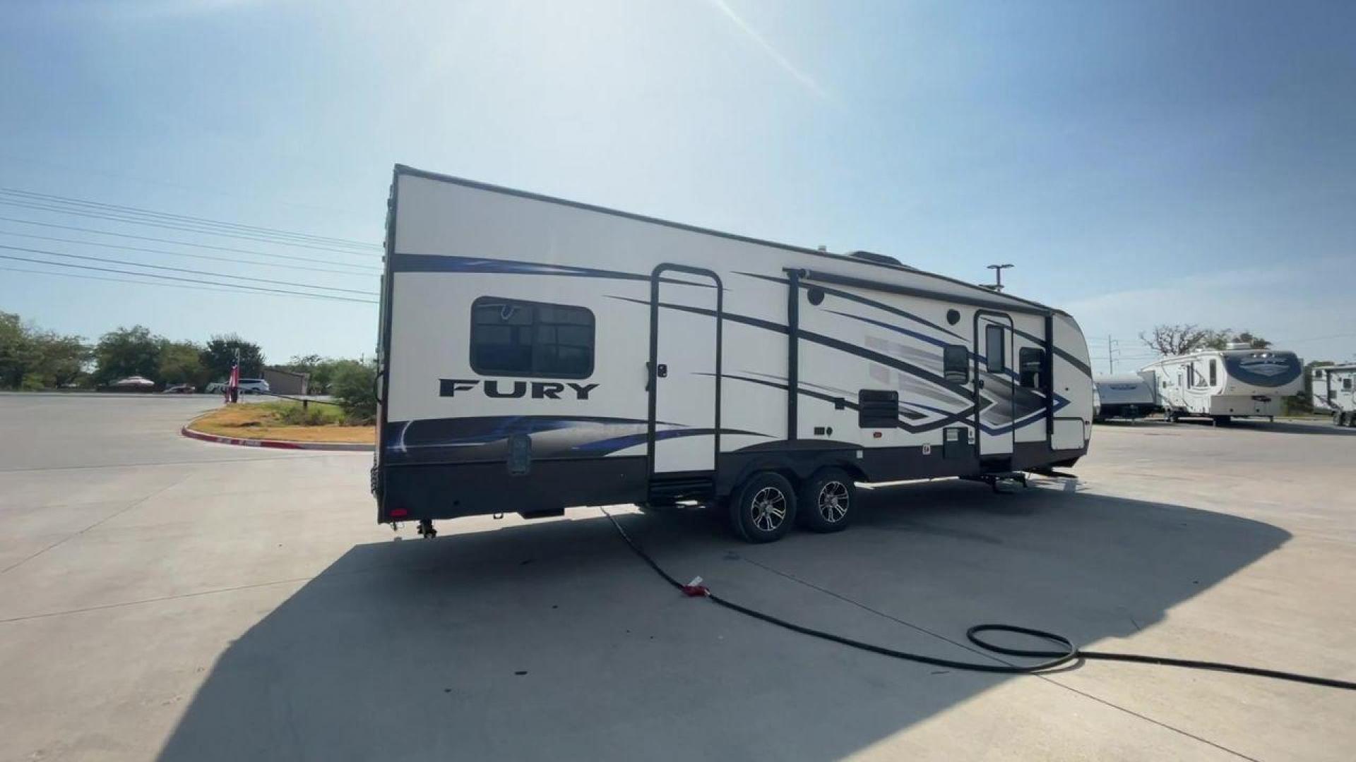 2018 GRAY HEARTLAND FURY 2910 (5ZT2FHUB2JG) , Length: 34.5 ft. | Dry Weight: 7,262 lbs. | Slides: 1 transmission, located at 4319 N Main Street, Cleburne, TX, 76033, (817) 221-0660, 32.435829, -97.384178 - The 2018 Prime Time Fury 2910 is a rugged and versatile toy hauler that seamlessly blends functionality with comfort for the ultimate adventure on the road. Measuring 34.5 feet in length, this toy hauler boasts an innovative design catered to the needs of outdoor enthusiasts. The Fury 2910 features - Photo#7