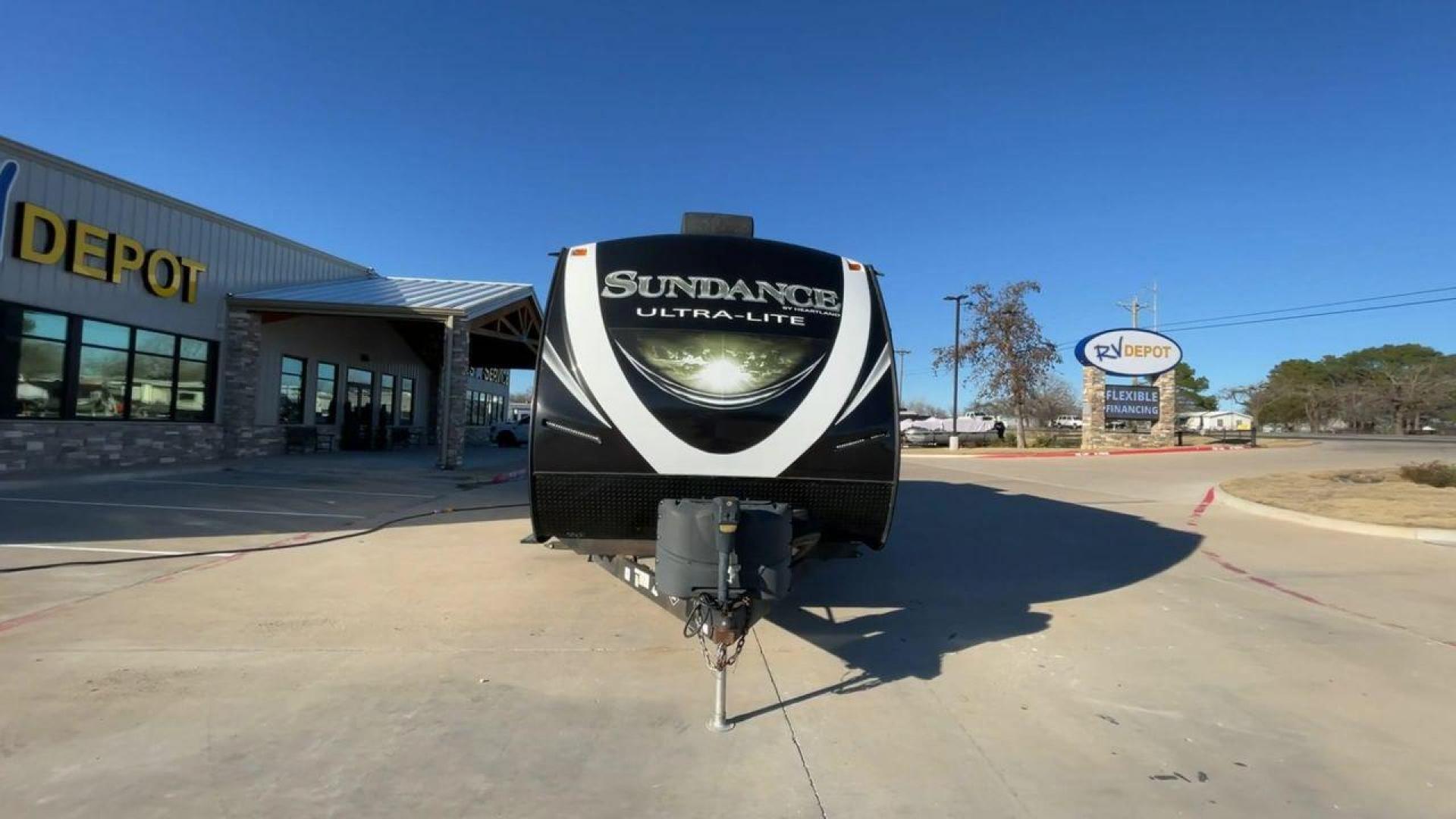 2018 HEARTLAND SUNDANCE 312BH (5SFNB3529JE) , Length: 35.4 ft.| Dry Weight: 6,844 lbs.| Gross Weight: 9,590 lbs.| Slides: 2 transmission, located at 4319 N Main Street, Cleburne, TX, 76033, (817) 221-0660, 32.435829, -97.384178 - Experience the ultimate in RV travel with the 2018 Heartland Sundance 31BH. This travel trailer is expertly designed to combine luxury and functionality, taking your adventures to new heights. With a generous length of 35 feet, this model provides ample space inside to accommodate families and outdo - Photo#4