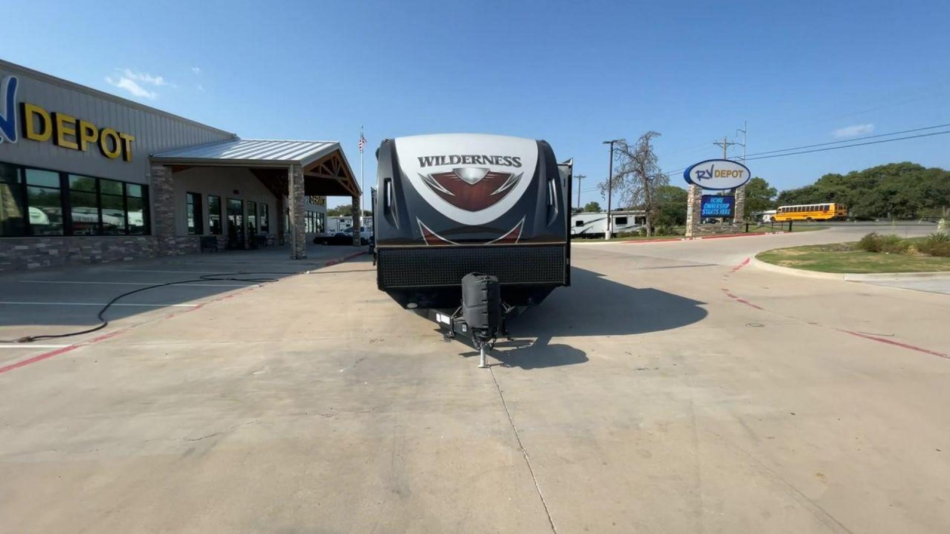 2018 GRAY HEARTLAND WILDERNESS 3375KL (5SFNB3926JE) , Length: 39.67 ft. | Dry Weight: 8,699 lbs. | Gross Weight: 9,600 lbs. | Slides: 3 transmission, located at 4319 N Main Street, Cleburne, TX, 76033, (817) 221-0660, 32.435829, -97.384178 - If you're searching for a travel trailer that offers the true comforts of a regular home, this 2018 Heartland Wilderness 3375KL is the one for you! It measures just a bit under 40 ft. in length and weighs 8,699 lbs. unloaded. It has a GVWR of 9,600 lbs. and a hitch weight of 799 lbs. It is sizable y - Photo#4