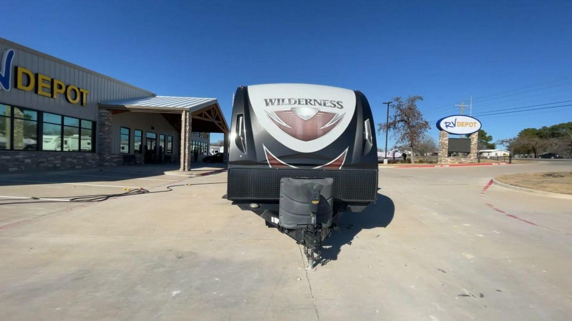 2018 GRAY HEARTLAND WILDERNESS USED 3125 (5SFNB3526JE) , Length: 35.75 ft. | Dry Weight: 6,840 lbs. | Gross Weight: 8,600 lbs. | Slides: 1 transmission, located at 4319 N Main Street, Cleburne, TX, 76033, (817) 221-0660, 32.435829, -97.384178 - Discover your inner adventurer with the Heartland Wilderness 3125 travel trailer from 2018. This RV offers the ideal balance of roomy living, contemporary conveniences, and tough sturdiness for your outdoor adventures. It is designed for individuals who desire both comfort and exploration. The dimen - Photo#3