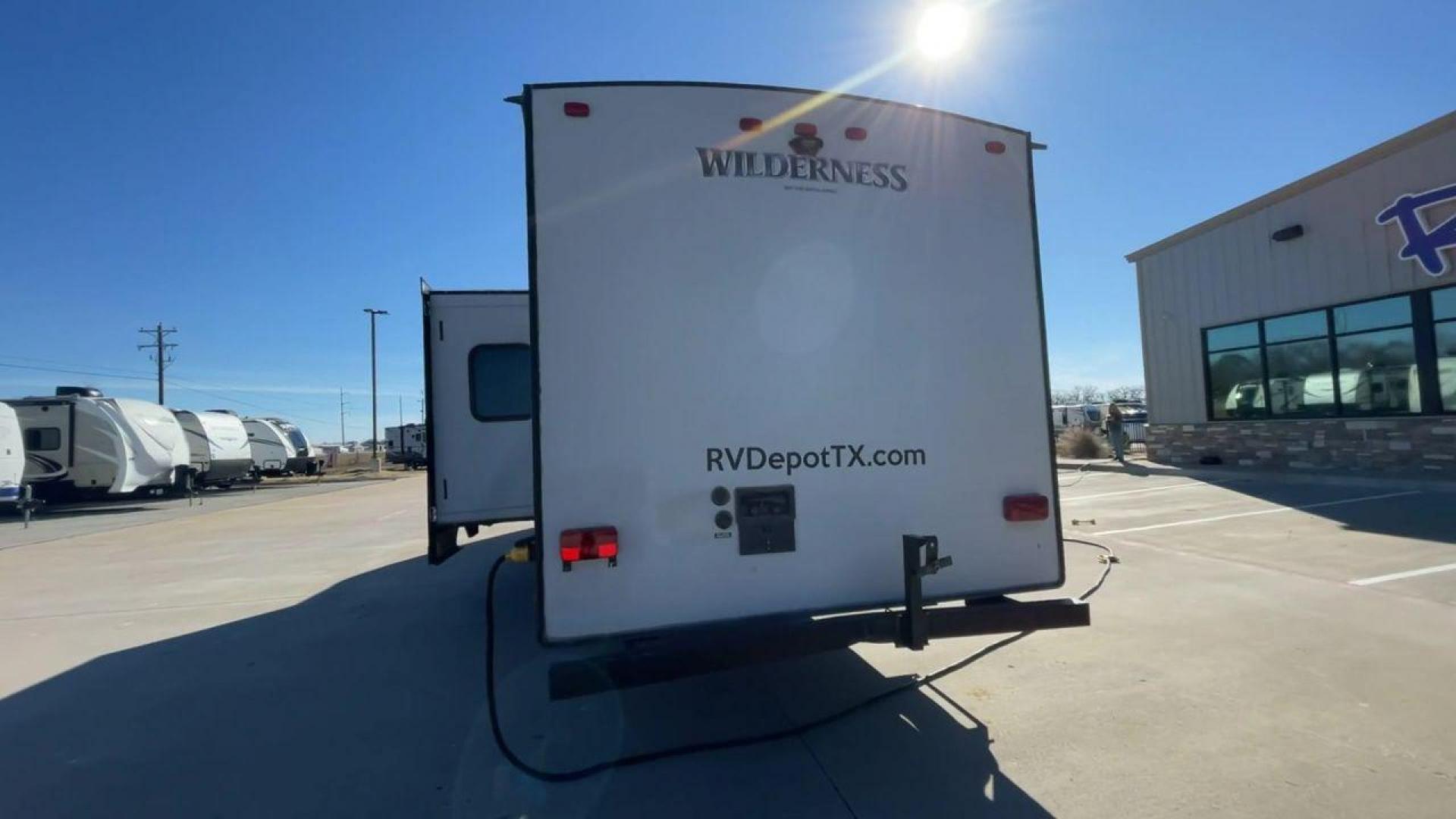 2018 GRAY HEARTLAND WILDERNESS USED 3125 (5SFNB3526JE) , Length: 35.75 ft. | Dry Weight: 6,840 lbs. | Gross Weight: 8,600 lbs. | Slides: 1 transmission, located at 4319 N Main Street, Cleburne, TX, 76033, (817) 221-0660, 32.435829, -97.384178 - Discover your inner adventurer with the Heartland Wilderness 3125 travel trailer from 2018. This RV offers the ideal balance of roomy living, contemporary conveniences, and tough sturdiness for your outdoor adventures. It is designed for individuals who desire both comfort and exploration. The dimen - Photo#7