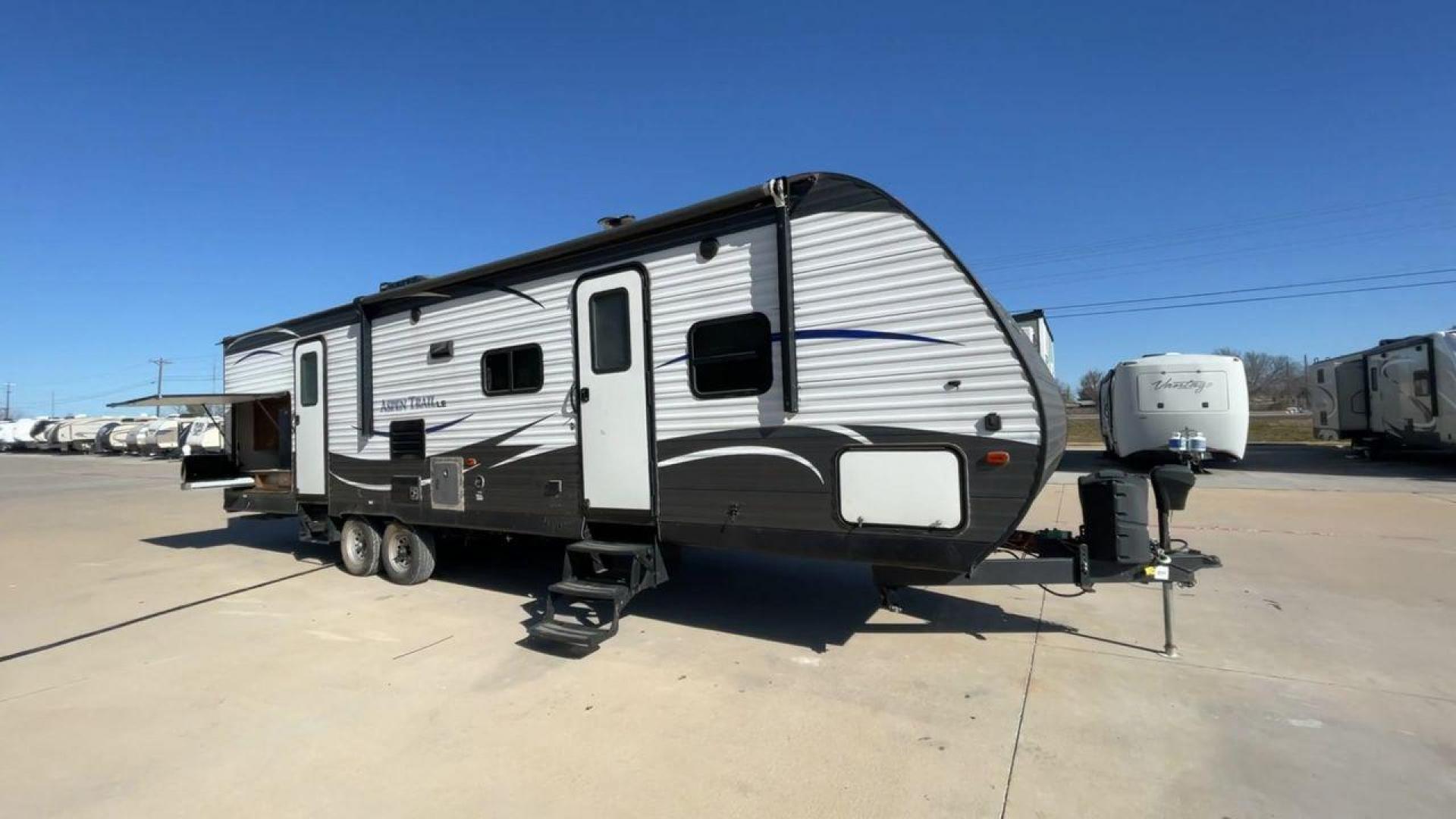 2018 KEYSTONE ASPEN TRAIL 31BH (4YDT31B2XJ8) , Length: 35.83 ft. | Dry Weight: 7,060 lbs. | Slides: 2 transmission, located at 4319 N Main Street, Cleburne, TX, 76033, (817) 221-0660, 32.435829, -97.384178 - This 2018 Keystone Aspen Trail 31BH is a dual-axle steel wheel setup measuring 35.83 ft. in length and 11.25 ft. in height. It has a dry weight of 7,060 lbs. and a payload capacity of 2,620 lbs. It includes two power slides as well as one power awning. This travel trailer is a bunk model that can - Photo#3