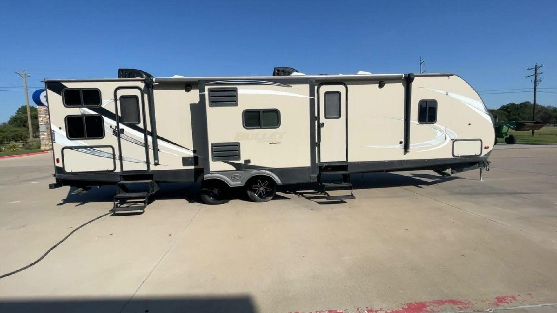 2018 KEYSTONE BULLET 330BHS (4YDT33024JT) , located at 4319 N Main Street, Cleburne, TX, 76033, (817) 221-0660, 32.435829, -97.384178 - The 2018 Keystone Bullet 330BHS offers a spacious and comfortable design. Measuring 37.42 feet in length, this RV is designed for easy towing without sacrificing comfort. It boasts three slide-outs that significantly increase the living space. The exterior features a smooth fiberglass finish with sl - Photo#2