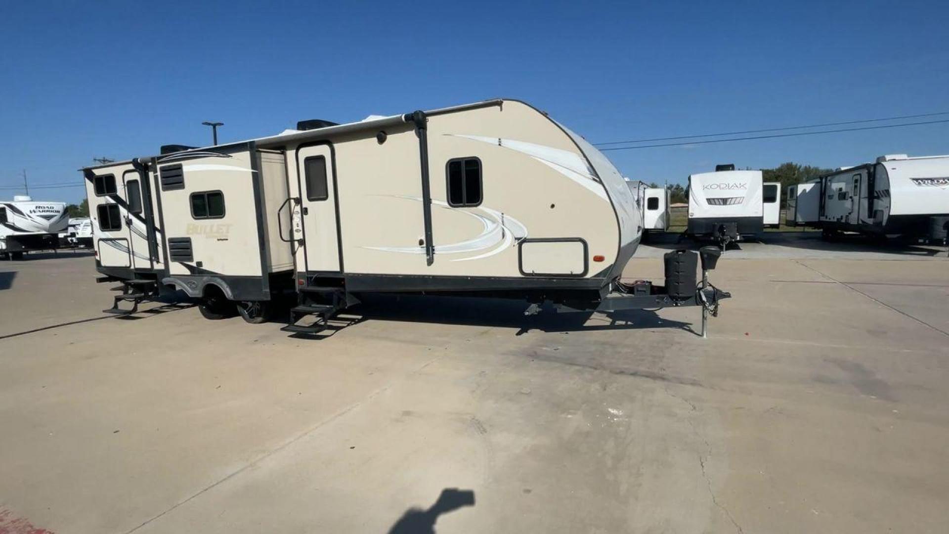 2018 KEYSTONE BULLET 330BHS (4YDT33024JT) , located at 4319 N Main Street, Cleburne, TX, 76033, (817) 221-0660, 32.435829, -97.384178 - The 2018 Keystone Bullet 330BHS offers a spacious and comfortable design. Measuring 37.42 feet in length, this RV is designed for easy towing without sacrificing comfort. It boasts three slide-outs that significantly increase the living space. The exterior features a smooth fiberglass finish with sl - Photo#3