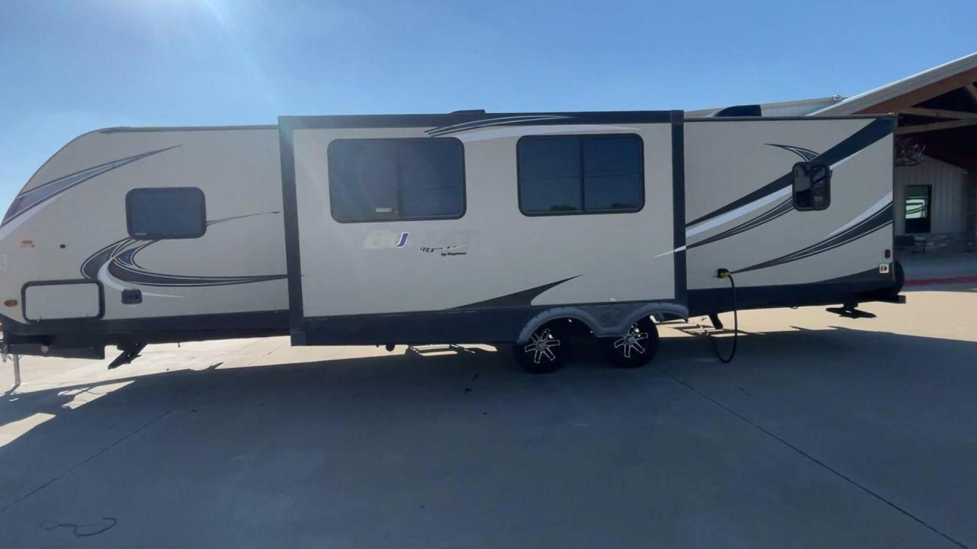 2018 KEYSTONE BULLET 330BHS (4YDT33024JT) , located at 4319 N Main Street, Cleburne, TX, 76033, (817) 221-0660, 32.435829, -97.384178 - The 2018 Keystone Bullet 330BHS offers a spacious and comfortable design. Measuring 37.42 feet in length, this RV is designed for easy towing without sacrificing comfort. It boasts three slide-outs that significantly increase the living space. The exterior features a smooth fiberglass finish with sl - Photo#6