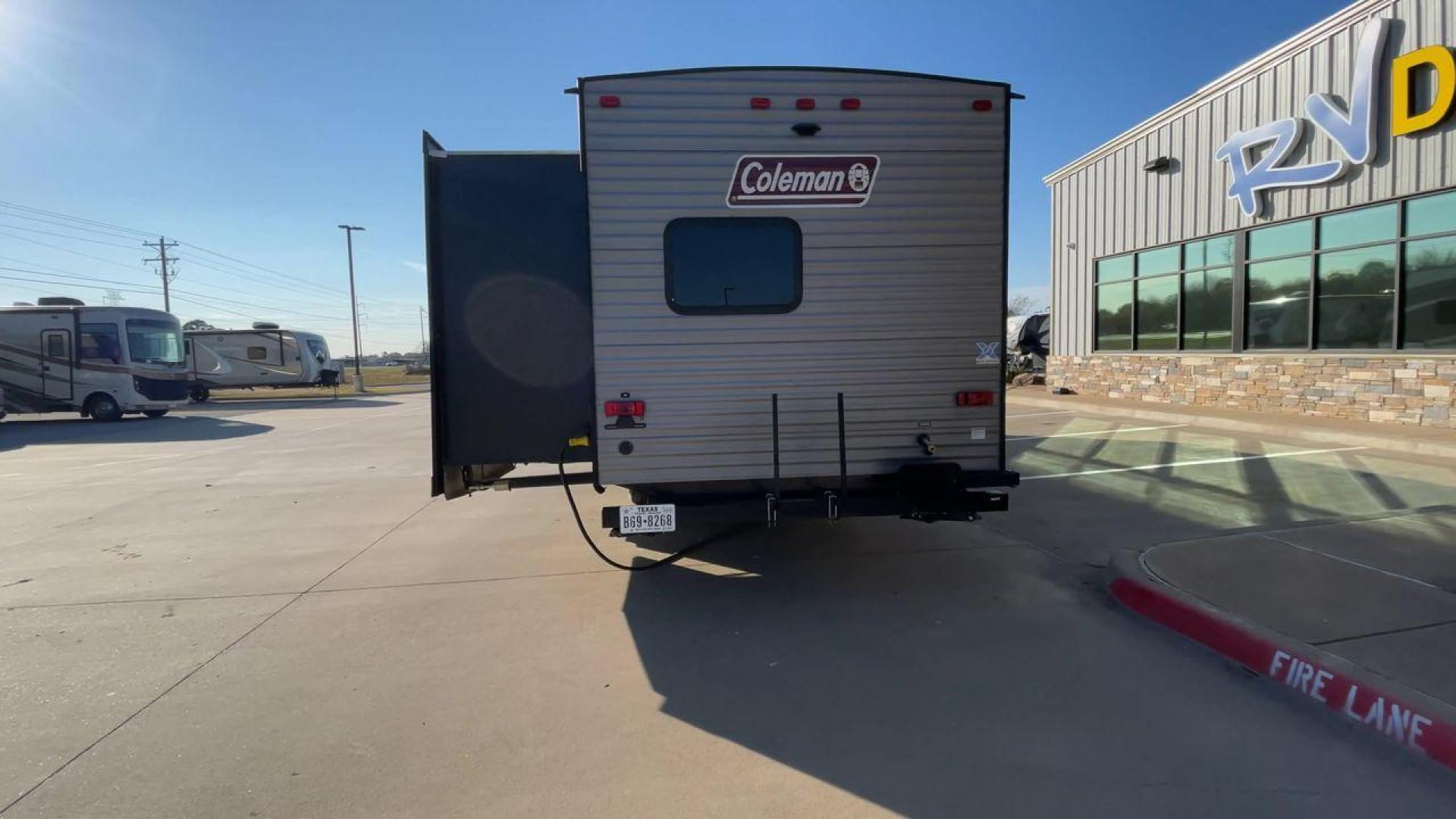 2018 SILVER KEYSTONE COLEMAN 337BH (4YDT33724JH) , Length: 37.92 ft. | Dry Weight: 8,352 lbs. | Slides: 3 transmission, located at 4319 N Main Street, Cleburne, TX, 76033, (817) 221-0660, 32.435829, -97.384178 - Discover extra features that contribute to making this RV an ideal investment. (1) The 2018 Keystone Coleman 337BH is a travel trailer known for its family-friendly features and spacious accommodations. (2) It has a rear bunkhouse features two bunks with a third bunk on top, making it ideal for - Photo#8