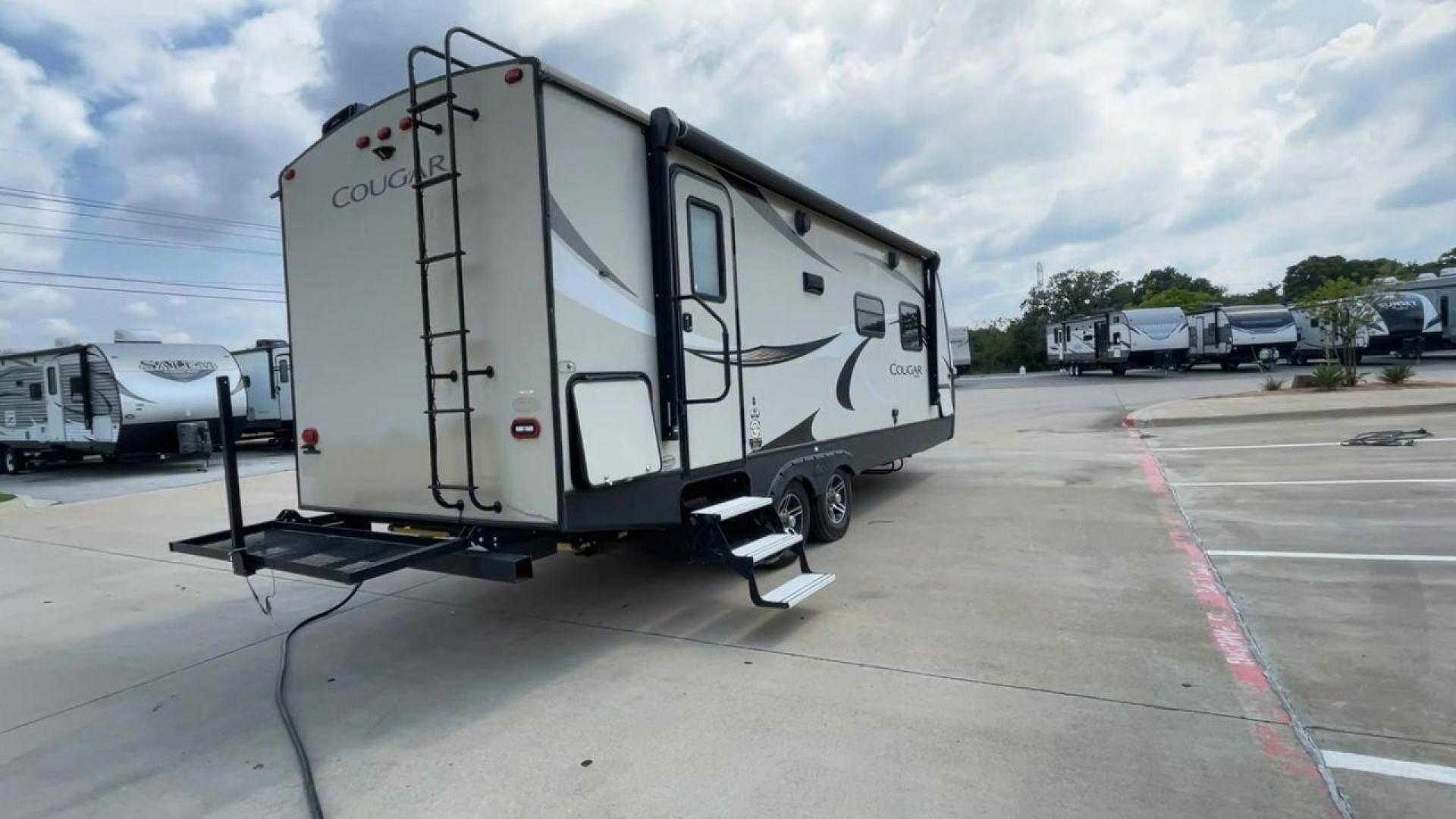 2018 WHITE KEYSTONE COUGAR 24RBS (4YDT24R29JV) , Length: 26.92 ft. | Dry Weight: 5,510 lbs. | Gross Weight: 7,500 lbs. | Slides: 1 transmission, located at 4319 N Main Street, Cleburne, TX, 76033, (817) 221-0660, 32.435829, -97.384178 - The 2018 Keystone Cougar 24RBS is a well-crafted travel trailer with a length of 26.92 feet and a dry weight of 5,510 lbs, offering a spacious yet lightweight option for travelers. Its gross weight capacity of 7,500 lbs provides ample room for packing all your adventure gear. The exterior features a - Photo#1