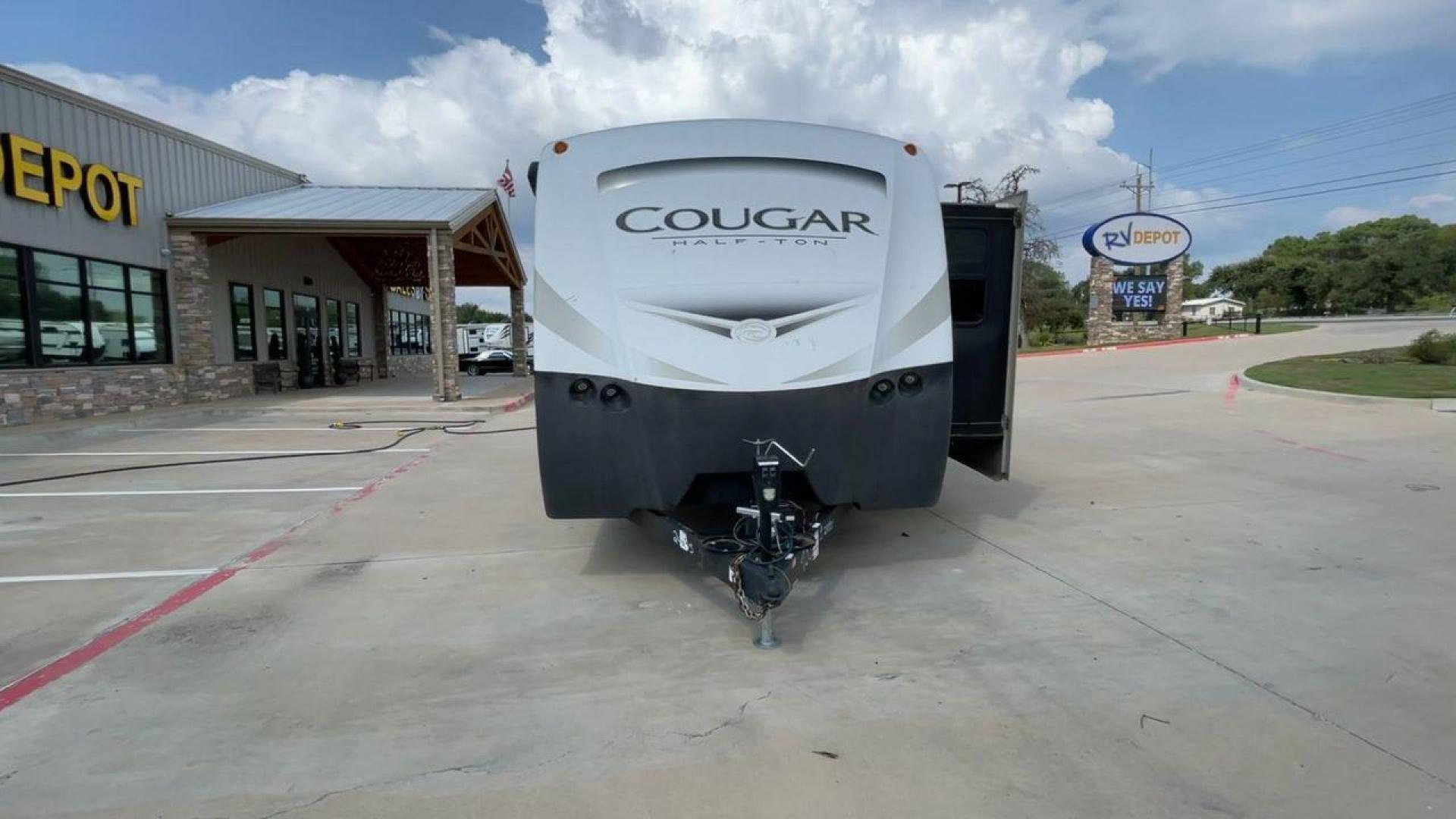 2018 WHITE KEYSTONE COUGAR 24RBS (4YDT24R29JV) , Length: 26.92 ft. | Dry Weight: 5,510 lbs. | Gross Weight: 7,500 lbs. | Slides: 1 transmission, located at 4319 N Main Street, Cleburne, TX, 76033, (817) 221-0660, 32.435829, -97.384178 - The 2018 Keystone Cougar 24RBS is a well-crafted travel trailer with a length of 26.92 feet and a dry weight of 5,510 lbs, offering a spacious yet lightweight option for travelers. Its gross weight capacity of 7,500 lbs provides ample room for packing all your adventure gear. The exterior features a - Photo#4