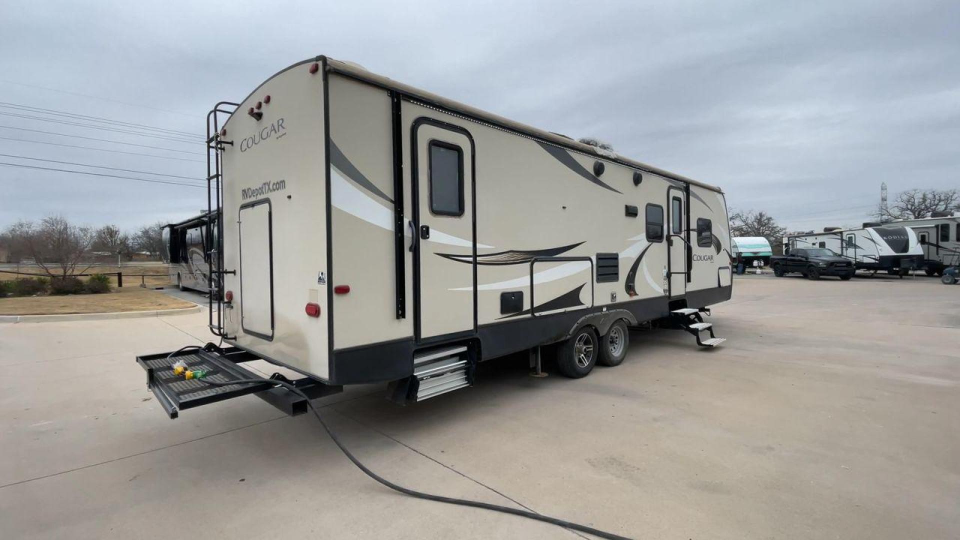 2018 WHITE KEYSTONE COUGAR 29BHS (4YDT29B29JV) , Length: 34.75 ft. | Dry Weight: 6,870 lbs. | Gross Weight: 8,800 lbs. | Slides: 1 transmission, located at 4319 N Main Street, Cleburne, TX, 76033, (817) 221-0660, 32.435829, -97.384178 - The 2018 Keystone Cougar 29BHS is a single-slide travel trailer that measures just a bit under 35 ft. in length. It has a dry weight of 6,870 lbs. and a GVWR of 8,800 lbs. Its exterior is a base color of tan with white and gray accents. It comes with an automatic heating and cooling rate of 35,000 a - Photo#1