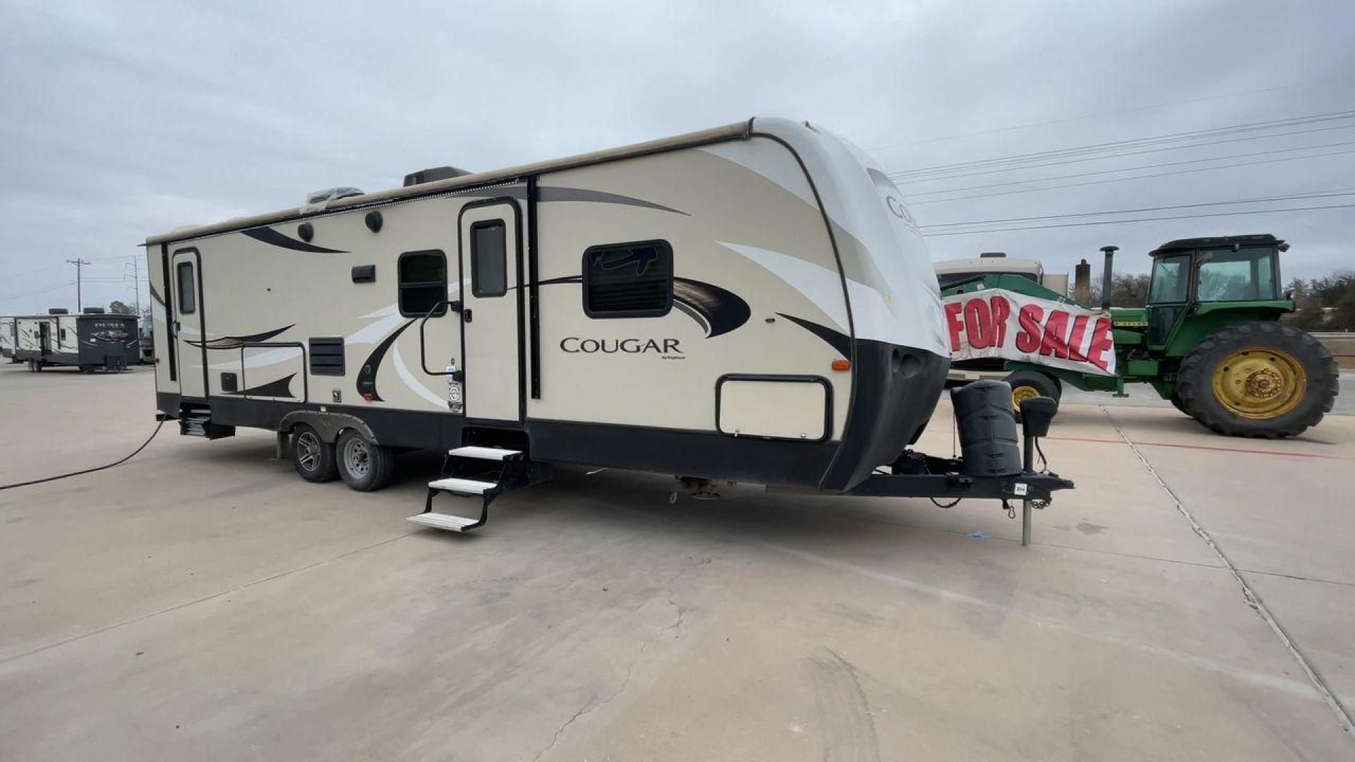 2018 WHITE KEYSTONE COUGAR 29BHS (4YDT29B29JV) , Length: 34.75 ft. | Dry Weight: 6,870 lbs. | Gross Weight: 8,800 lbs. | Slides: 1 transmission, located at 4319 N Main Street, Cleburne, TX, 76033, (817) 221-0660, 32.435829, -97.384178 - The 2018 Keystone Cougar 29BHS is a single-slide travel trailer that measures just a bit under 35 ft. in length. It has a dry weight of 6,870 lbs. and a GVWR of 8,800 lbs. Its exterior is a base color of tan with white and gray accents. It comes with an automatic heating and cooling rate of 35,000 a - Photo#3