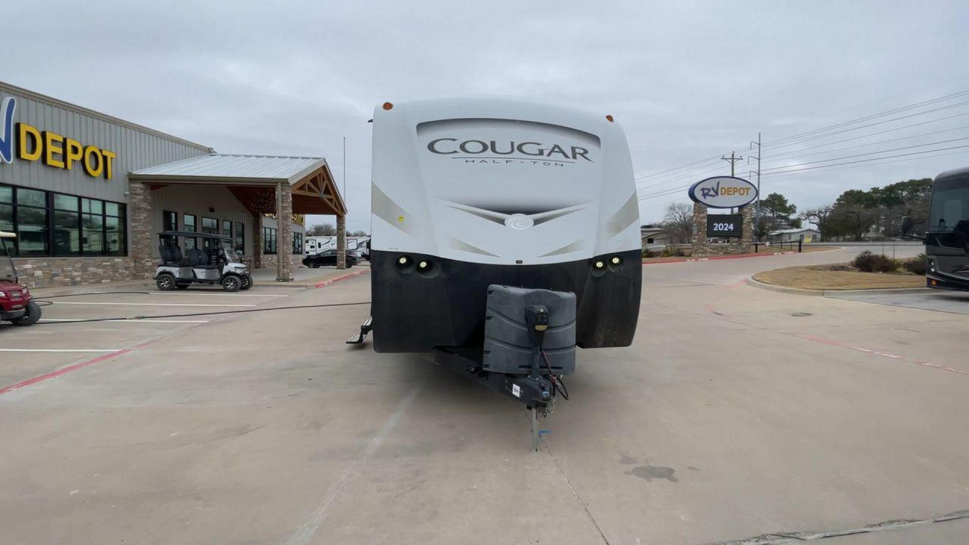 2018 WHITE KEYSTONE COUGAR 29BHS (4YDT29B29JV) , Length: 34.75 ft. | Dry Weight: 6,870 lbs. | Gross Weight: 8,800 lbs. | Slides: 1 transmission, located at 4319 N Main Street, Cleburne, TX, 76033, (817) 221-0660, 32.435829, -97.384178 - The 2018 Keystone Cougar 29BHS is a single-slide travel trailer that measures just a bit under 35 ft. in length. It has a dry weight of 6,870 lbs. and a GVWR of 8,800 lbs. Its exterior is a base color of tan with white and gray accents. It comes with an automatic heating and cooling rate of 35,000 a - Photo#4