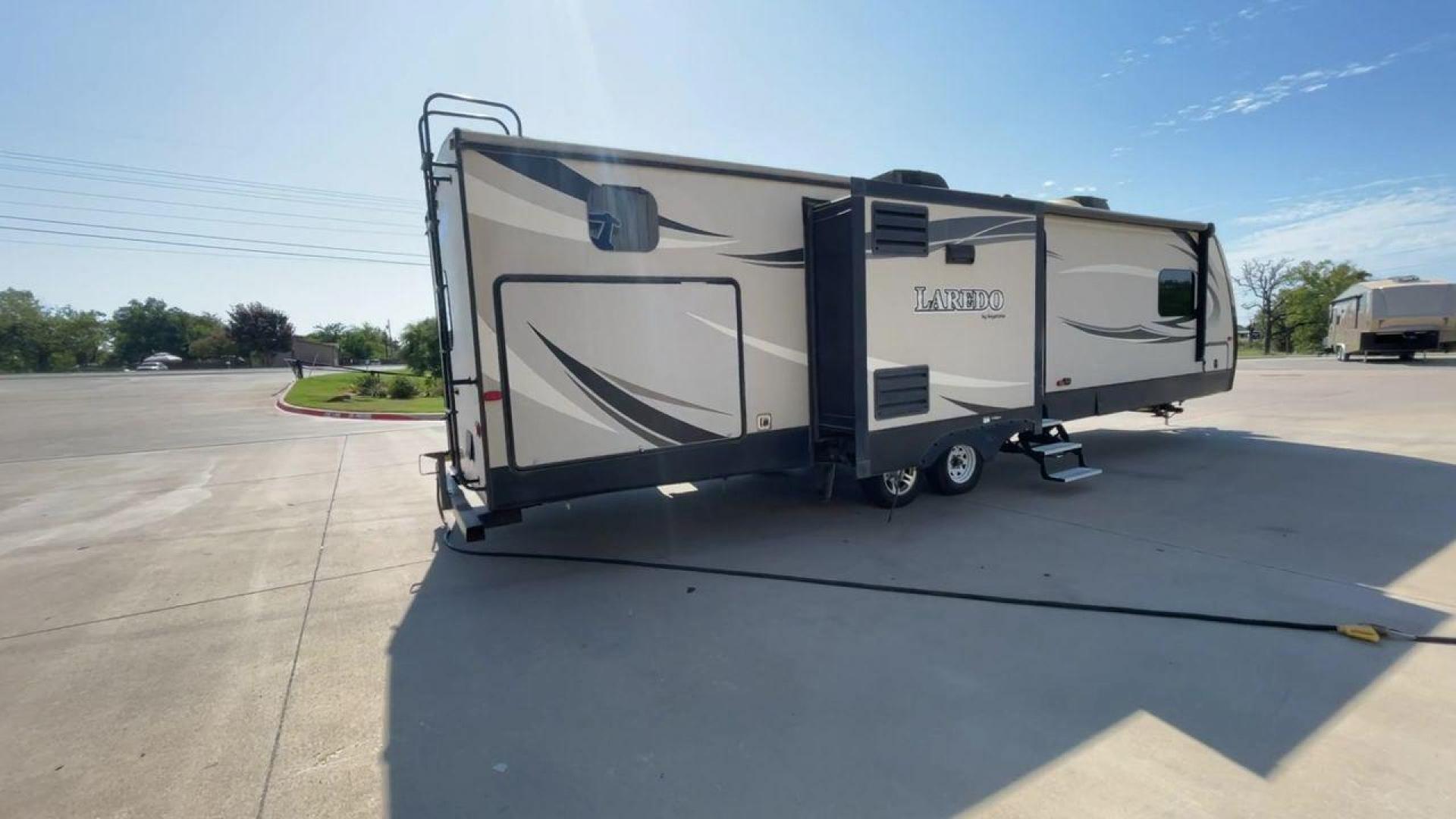 2018 KEYSTONE LAREDO 331BH (4YDT33129JV) , Length: 37.92 ft. | Dry Weight: 8,090 lbs. | Gross Weight: 9,655 lbs. 9,655 lbs. | Slides: 3 transmission, located at 4319 N Main Street, Cleburne, TX, 76033, (817) 221-0660, 32.435829, -97.384178 - Photo#1