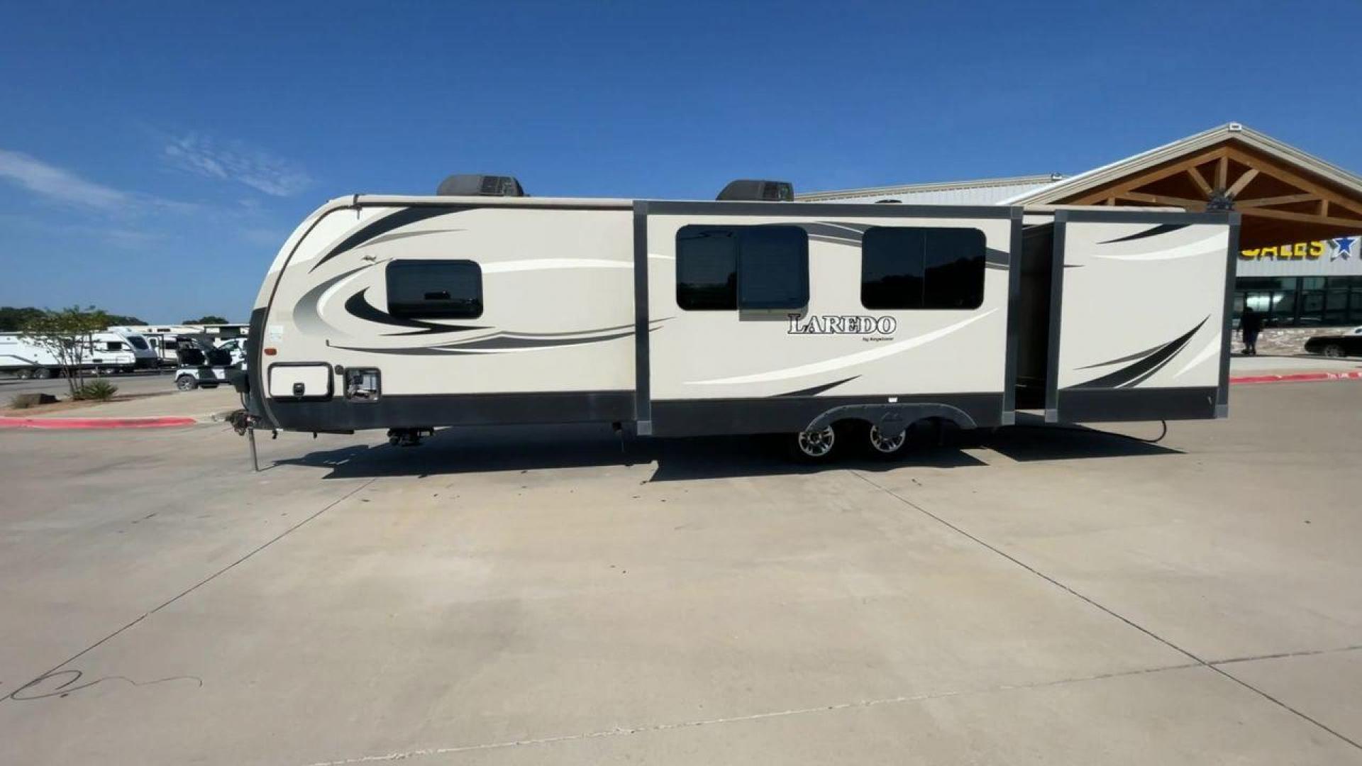 2018 KEYSTONE LAREDO 331BH (4YDT33129JV) , Length: 37.92 ft. | Dry Weight: 8,090 lbs. | Gross Weight: 9,655 lbs. 9,655 lbs. | Slides: 3 transmission, located at 4319 N Main Street, Cleburne, TX, 76033, (817) 221-0660, 32.435829, -97.384178 - Photo#6