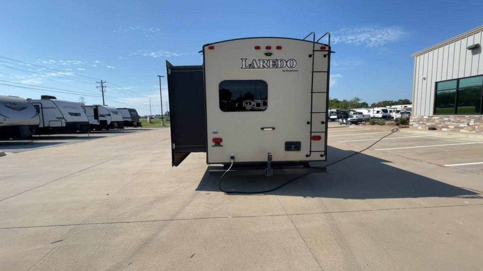 2018 KEYSTONE LAREDO 331BH (4YDT33129JV) , Length: 37.92 ft. | Dry Weight: 8,090 lbs. | Gross Weight: 9,655 lbs. 9,655 lbs. | Slides: 3 transmission, located at 4319 N Main Street, Cleburne, TX, 76033, (817) 221-0660, 32.435829, -97.384178 - Photo#8