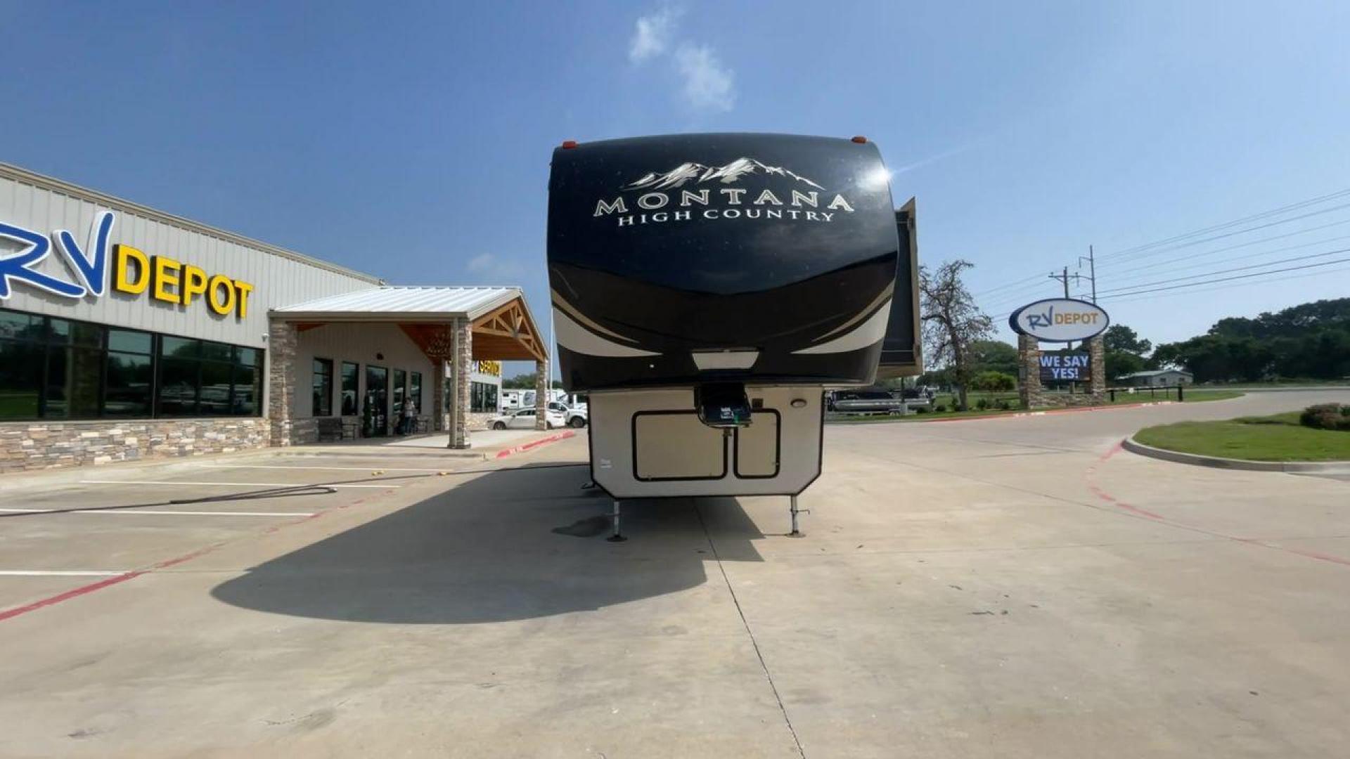 2018 TAN KEYSTONE MONTANA 305RL (4YDF3052XJA) , Length: 35.67 ft. | Dry Weight: 10,390 lbs. | Gross Weight: 14,270 lbs. | Slides: 3 transmission, located at 4319 N Main Street, Cleburne, TX, 76033, (817) 221-0660, 32.435829, -97.384178 - The 2018 Keystone Montana 305RL is a dual-axle aluminum wheel set-up that measures 35.67 ft. in length. It has a dry weight of 10,390 lbs. and a GVWR of 14,270 lbs. It is made of aluminum and fiberglass. It comes with automatic heating and cooling rated at 35,000 and 15,000 BTUs respectively. With 3 - Photo#4