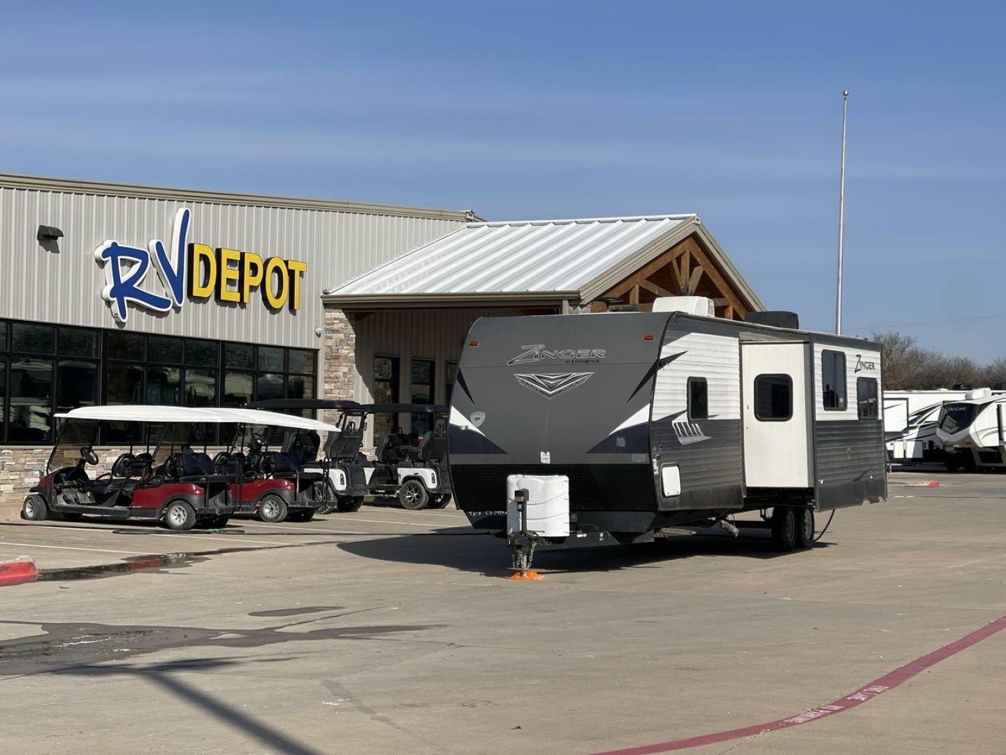 2018 GRAY KEYSTONE ZINGER 330BH (4YDT3302XJS) , Length: 37.5 ft. | Dry Weight: 7,980 lbs. | Gross Weight: 9,800 lbs. | Slides: 2 transmission, located at 4319 N Main Street, Cleburne, TX, 76033, (817) 221-0660, 32.435829, -97.384178 - This 2018 Keystone Zinger 330BH is a dual-axle steel wheel setup measuring 37.5 ft. long and 11.25 ft. tall. It has a dry weight of 7,980 lbs. and a GVWR of 9,800 lbs. It also comes with two slides as well as one 20-foot awning. This travel trailer is a bunkhouse model that offers sleeping space f - Photo#0