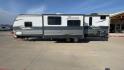 2018 GRAY KEYSTONE ZINGER 330BH (4YDT3302XJS) , Length: 37.5 ft. | Dry Weight: 7,980 lbs. | Gross Weight: 9,800 lbs. | Slides: 2 transmission, located at 4319 N Main Street, Cleburne, TX, 76033, (817) 221-0660, 32.435829, -97.384178 - This 2018 Keystone Zinger 330BH is a dual-axle steel wheel setup measuring 37.5 ft. long and 11.25 ft. tall. It has a dry weight of 7,980 lbs. and a GVWR of 9,800 lbs. It also comes with two slides as well as one 20-foot awning. This travel trailer is a bunkhouse model that offers sleeping space f - Photo#6