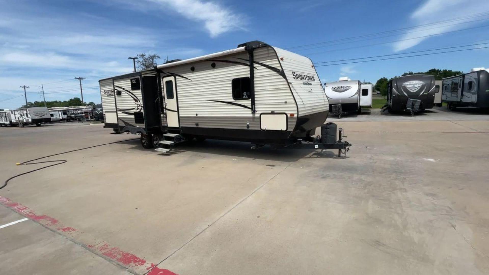 2018 BEIGE K-Z SPORTSMEN 333 BHK (4EZTS3320J5) , Length: 36.67 ft. | Dry Weight: 8,520 lbs. | Gross Weight: 9,995 lbs. | Slides: 3 transmission, located at 4319 N Main Street, Cleburne, TX, 76033, (817) 221-0660, 32.435829, -97.384178 - Wanting to explore the great outdoors with comfort and convenience? The 2018 KZ Sportsmen 333BHK travel trailer is an ideal camper for you! Featuring a rear private bunkhouse, triple slides, an outdoor kitchen, and so much more! This trailer measures approximately 36.67 ft in length, 8 ft in width, - Photo#3