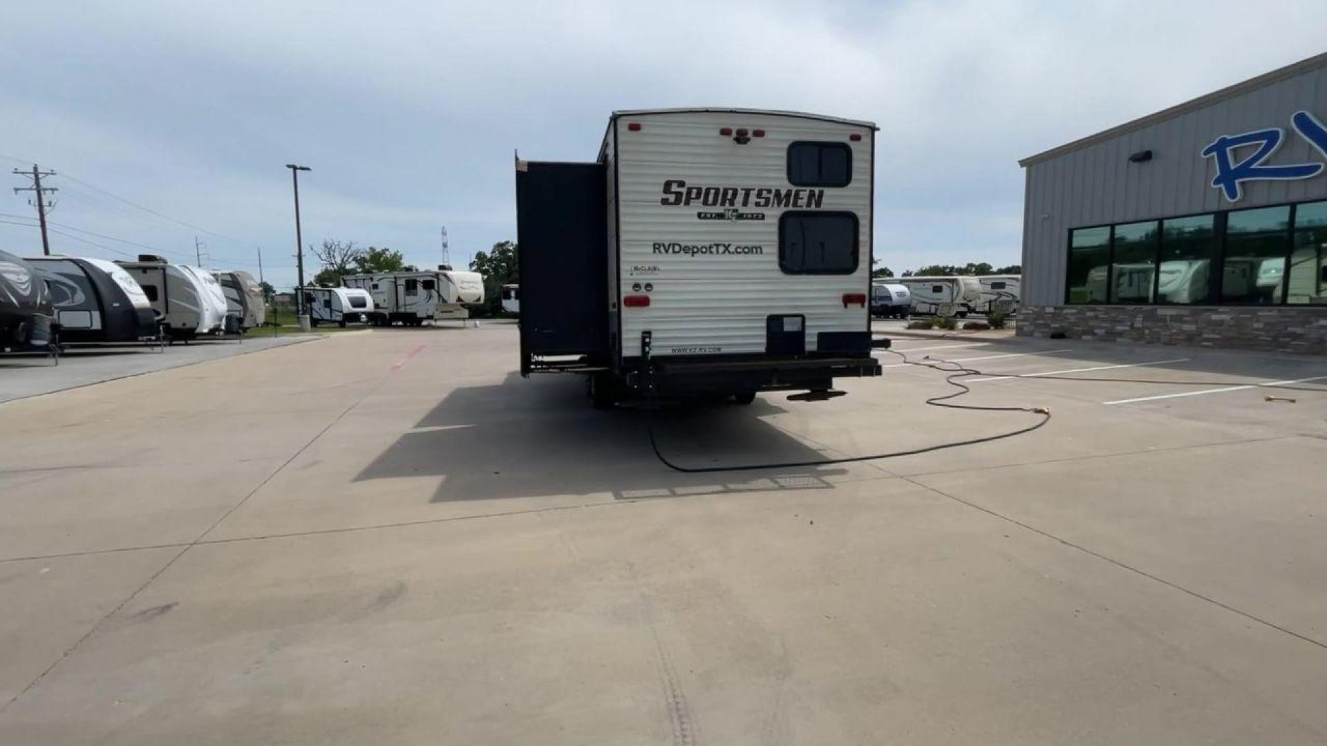 2018 BEIGE K-Z SPORTSMEN 333 BHK (4EZTS3320J5) , Length: 36.67 ft. | Dry Weight: 8,520 lbs. | Gross Weight: 9,995 lbs. | Slides: 3 transmission, located at 4319 N Main Street, Cleburne, TX, 76033, (817) 221-0660, 32.435829, -97.384178 - Wanting to explore the great outdoors with comfort and convenience? The 2018 KZ Sportsmen 333BHK travel trailer is an ideal camper for you! Featuring a rear private bunkhouse, triple slides, an outdoor kitchen, and so much more! This trailer measures approximately 36.67 ft in length, 8 ft in width, - Photo#8