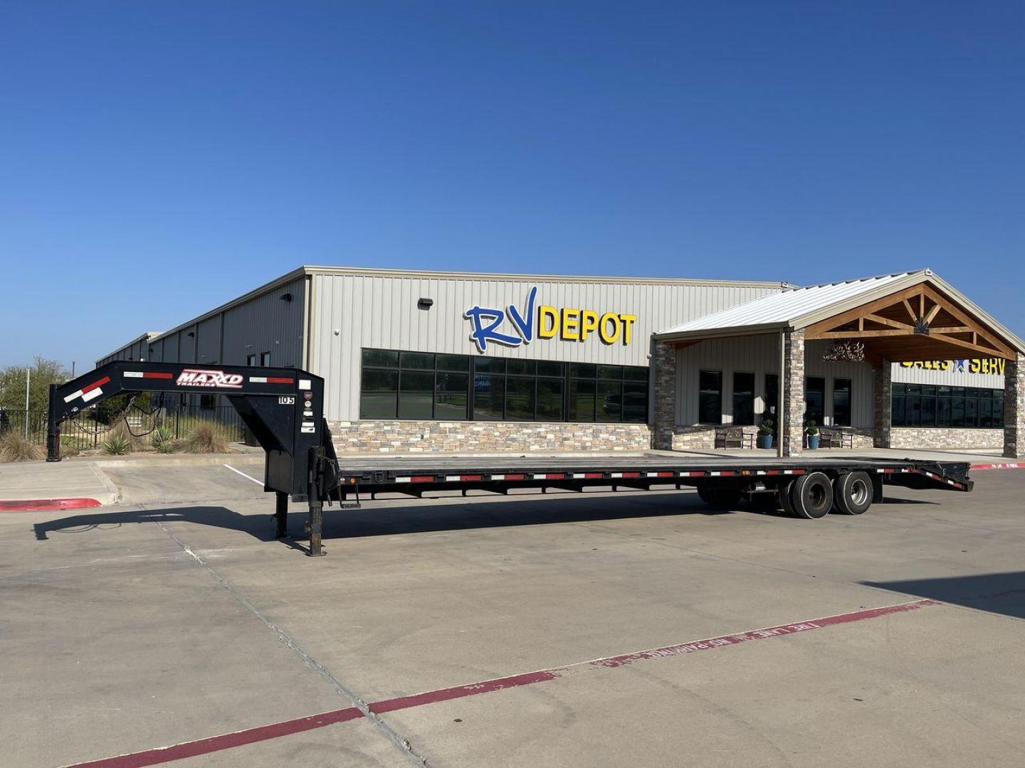 2018 BLACK MAXEY TRAILERS LDX 40 - (5R8GF4027JM) , located at 4319 N Main Street, Cleburne, TX, 76033, (817) 221-0660, 32.435829, -97.384178 - The 2018 Maxey Trailers LDX40 is a top-notch utility trailer that excels in handling a diverse array of hauling tasks. This trailer is perfect for effortlessly transporting equipment, materials, and cargo, thanks to its sturdy construction and adaptable design. The LDX40 is a spacious option, measur - Photo#9