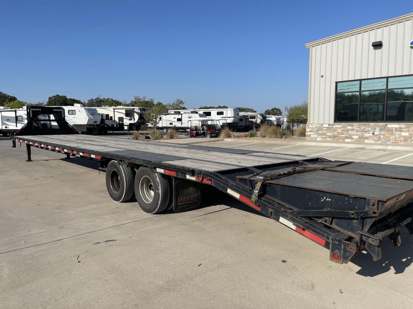 2018 BLACK MAXEY TRAILERS LDX 40 - (5R8GF4027JM) , located at 4319 N Main Street, Cleburne, TX, 76033, (817) 221-0660, 32.435829, -97.384178 - The 2018 Maxey Trailers LDX40 is a top-notch utility trailer that excels in handling a diverse array of hauling tasks. This trailer is perfect for effortlessly transporting equipment, materials, and cargo, thanks to its sturdy construction and adaptable design. The LDX40 is a spacious option, measur - Photo#14