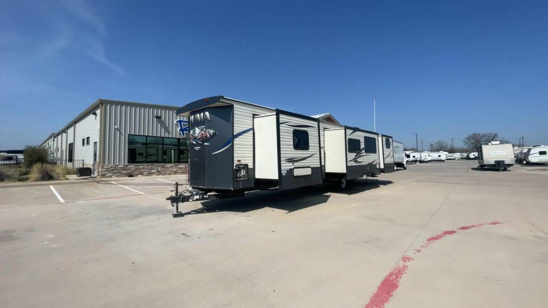 2018 PUMA 39PQB - (4X4TPUR2XJP) , located at 4319 N Main Street, Cleburne, TX, 76033, (817) 221-0660, 32.435829, -97.384178 - This Puma Travel Trailer measures just over 42 feet long and 8 feet wide with a dry weight of 10,709 lbs. It has a GVWR of 13,413 lbs and a hitch weight of 1,413 lbs. This unit comes with automatic heating and cooling rated at 35,000 and 13,500 BTUs respectively. The exterior of this unit is a base - Photo#5