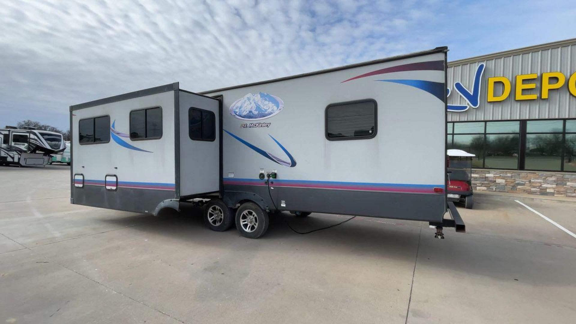 2018 GRAY RIVERSIDE MT MCKINLEY 830FK - (59CCC3223JL) , Length: 32 ft | Dry Weight: 5660 lbs | Slides: 1 transmission, located at 4319 N Main Street, Cleburne, TX, 76033, (817) 221-0660, 32.435829, -97.384178 - With so much floor space to spare, the Riverside RV 830FK Mt. McKinley single slide travel trailer is the perfect way to start your next camping trip. This unit measures 32 ft in length, 8 ft in width, and 10.5 ft in height. It has a dry weight of 5,660 lbs., with a cargo capacity of 1,975 lbs., - Photo#7