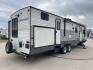 2018 TRAILMASTER 321TBS - (1NL1G372XJ1) , Length: 35.67 ft. | Dry Weight: 7,506 lbs. | Slides: 2 transmission, located at 4319 N Main Street, Cleburne, TX, 76033, (817) 221-0660, 32.435829, -97.384178 - The 2018 Trailmaster 321TBS Travel Trailer is a family-friendly RV designed to provide comfort and convenience for all your camping adventures. Measuring 35.67 ft. in length, 8 ft. in width, and 10.75 ft. in height, this travel trailer offers a spacious interior with thoughtful features. It has a dr - Photo#24