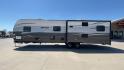 2019 TAN FOREST RIVER AVENGER 32DEN (5ZT2AVXB6KB) , Length: 37.92 ft. | Dry Weight: 7,989 lbs. | Slides: 2 transmission, located at 4319 N Main Street, Cleburne, TX, 76033, (817) 221-0660, 32.435829, -97.384178 - Measuring an impressive 36 feet, this model unfolds to reveal two strategically placed slide-outs, creating a spacious haven for relaxation. The master bedroom welcomes you with a queen-size bed and ample storage, ensuring a peaceful retreat after a day of outdoor exploration. The living area is a h - Photo#6