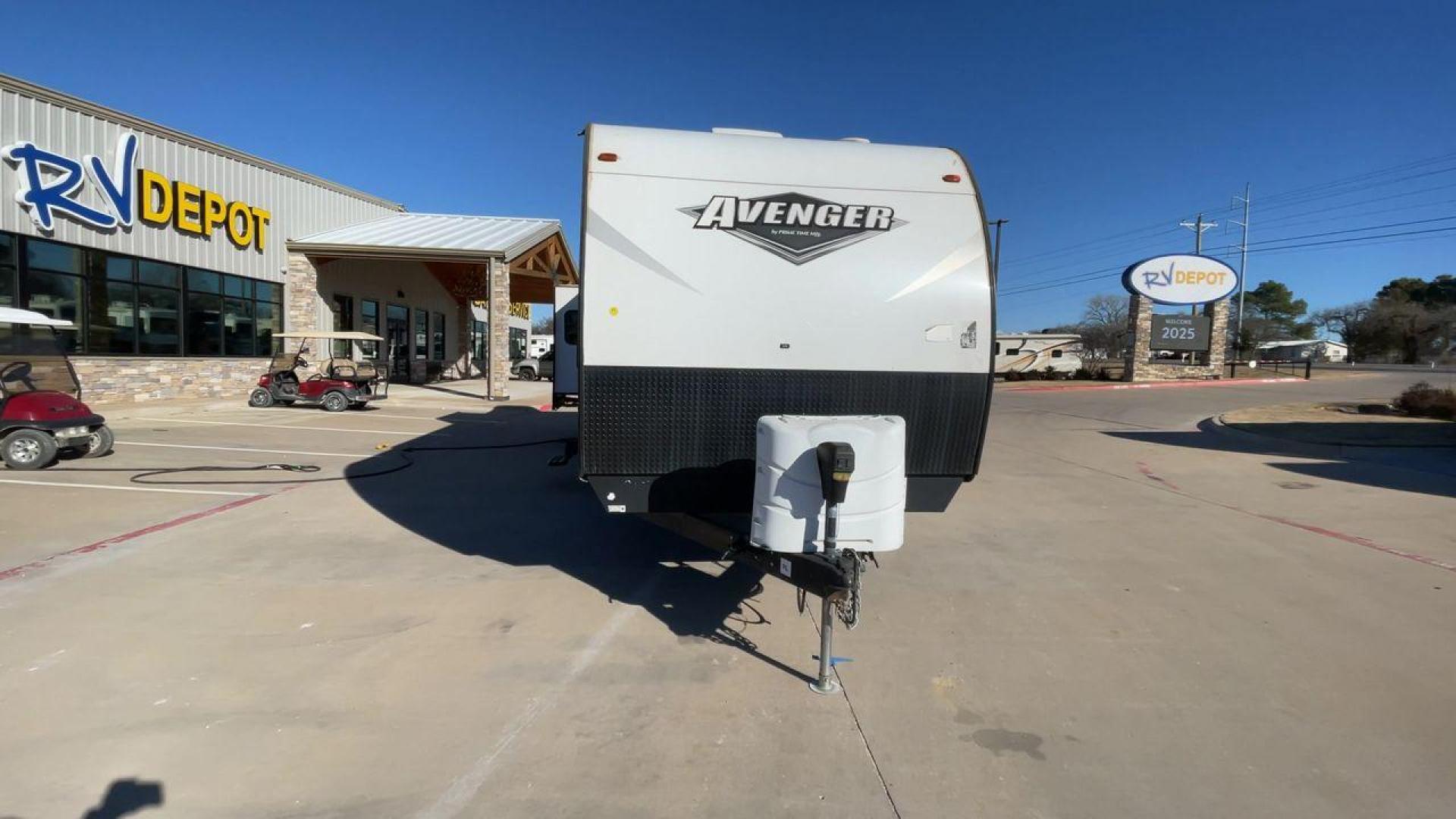 2019 TAN FOREST RIVER AVENGER 32DEN (5ZT2AVXB6KB) , Length: 37.92 ft. | Dry Weight: 7,989 lbs. | Slides: 2 transmission, located at 4319 N Main Street, Cleburne, TX, 76033, (817) 221-0660, 32.435829, -97.384178 - Measuring an impressive 36 feet, this model unfolds to reveal two strategically placed slide-outs, creating a spacious haven for relaxation. The master bedroom welcomes you with a queen-size bed and ample storage, ensuring a peaceful retreat after a day of outdoor exploration. The living area is a h - Photo#4