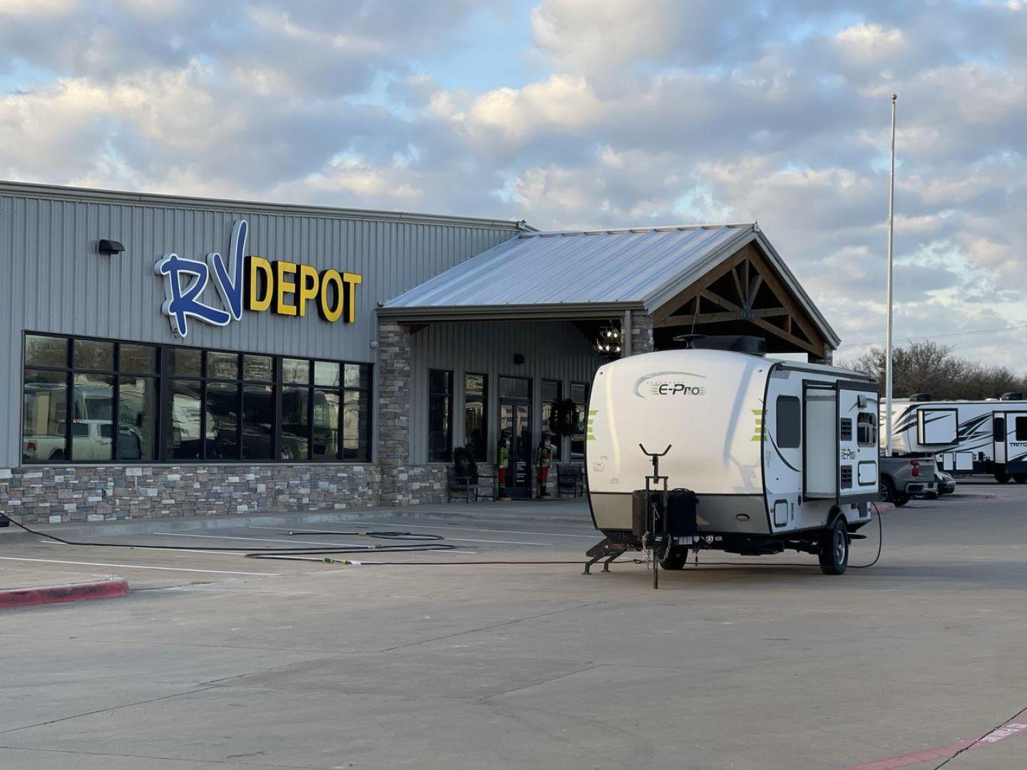 2019 FOREST RIVER FLAGSTAFF E-PRO 16BH (5ZT2FSEC3K3) , Length: 18.33 ft. | Dry Weight: 2,993 lbs. | Slides: 1 transmission, located at 4319 N Main Street, Cleburne, TX, 76033, (817) 221-0660, 32.435829, -97.384178 - The 2019 Forest River Flagstaff E-Pro 16BH is a compact, lightweight travel trailer designed for adventure. Its exterior features a sleek and modern design with a white body accented by bold green graphics, giving it a fresh and sporty look. The single slide-out on the driver's side provides additio - Photo#0