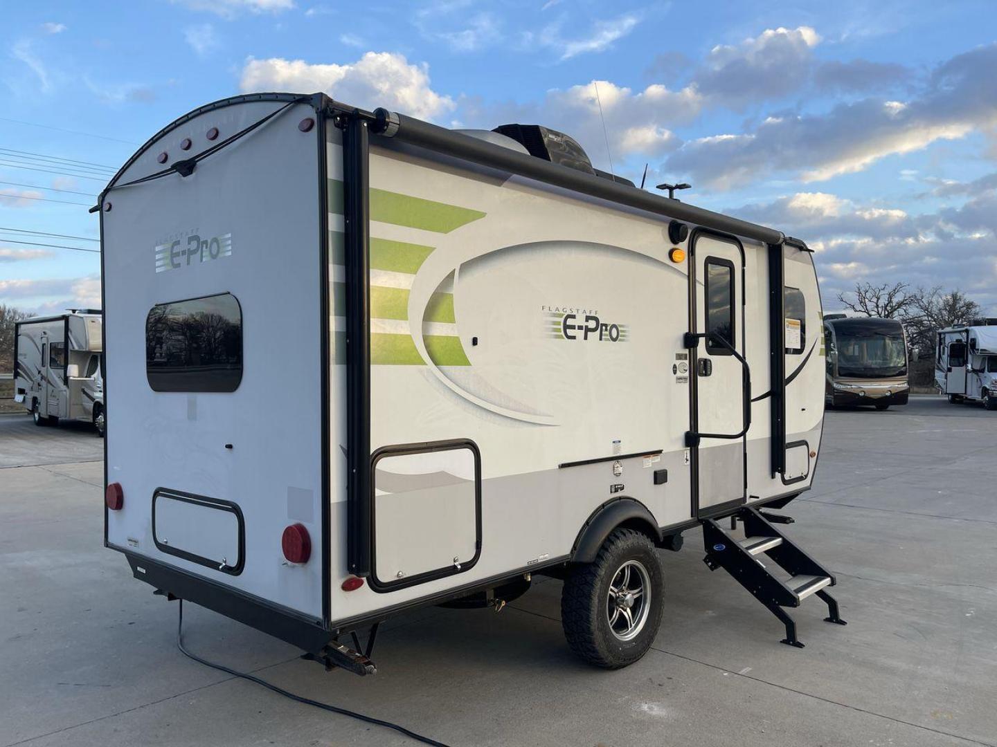 2019 FOREST RIVER FLAGSTAFF E-PRO 16BH (5ZT2FSEC3K3) , Length: 18.33 ft. | Dry Weight: 2,993 lbs. | Slides: 1 transmission, located at 4319 N Main Street, Cleburne, TX, 76033, (817) 221-0660, 32.435829, -97.384178 - The 2019 Forest River Flagstaff E-Pro 16BH is a compact, lightweight travel trailer designed for adventure. Its exterior features a sleek and modern design with a white body accented by bold green graphics, giving it a fresh and sporty look. The single slide-out on the driver's side provides additio - Photo#25