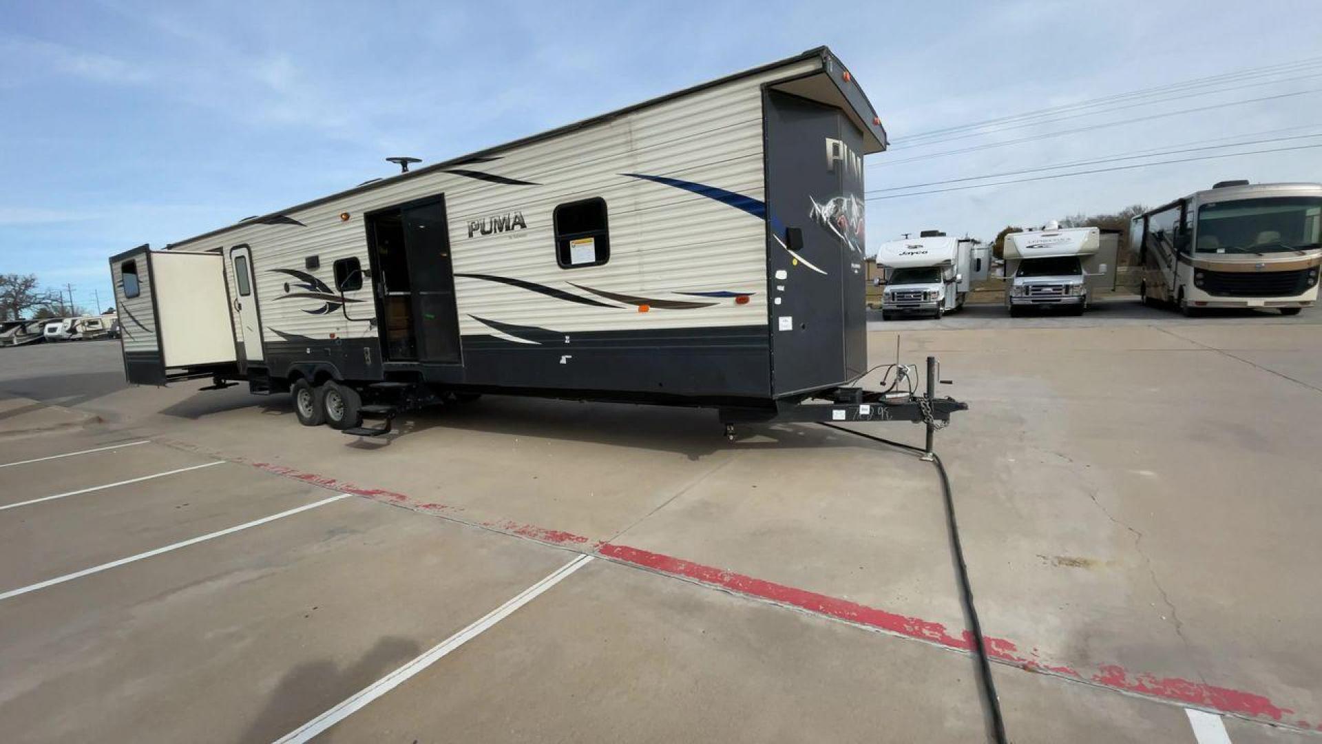 2019 FOREST RIVER PUMA 39PQB (4X4TPUR2XKP) , Length: 42.08 ft. | Dry Weight: 10,709 lbs. | Gross Weight: 13,413 lbs. | Slides: 4 transmission, located at 4319 N Main Street, Cleburne, TX, 76033, (817) 221-0660, 32.435829, -97.384178 - Photo#3