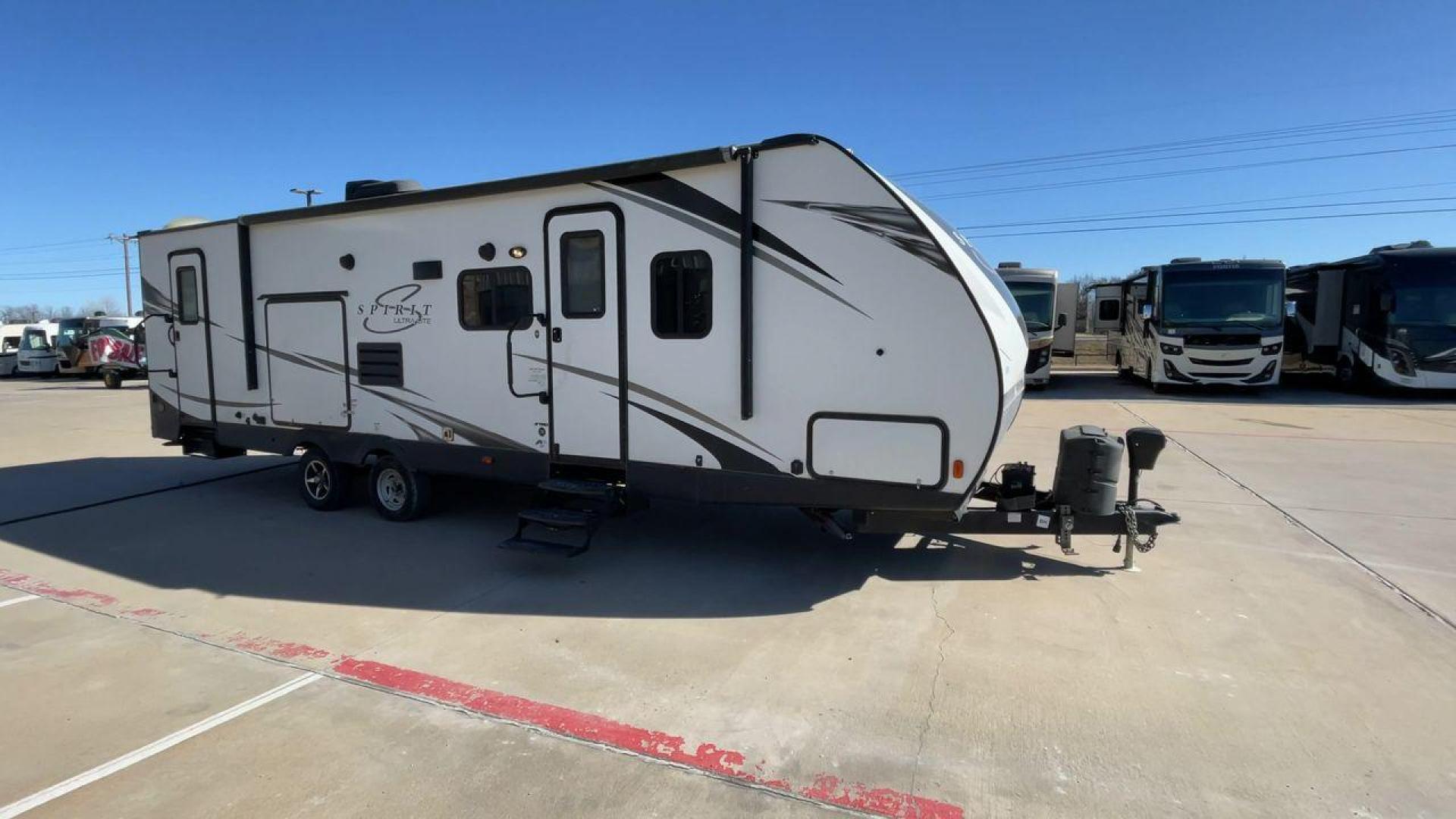 2019 FOREST RIVER SPIRIT 2963BH (5ZT2SBVB9KS) , Length: 33.92 ft. | Dry Weight: 6,408 lbs. | Slides: 1 transmission, located at 4319 N Main Street, Cleburne, TX, 76033, (817) 221-0660, 32.435829, -97.384178 - This 2019 Forest River Spirit 2963BH is a dual-axle aluminum wheel setup measuring just under 34 feet long. It has a dry weight of 6,408 lbs. and a payload capacity of 1,192 lbs. It also has a manageable hitch weight of 760 lbs. It features two doors and one slide. This travel trailer offers sleepin - Photo#3