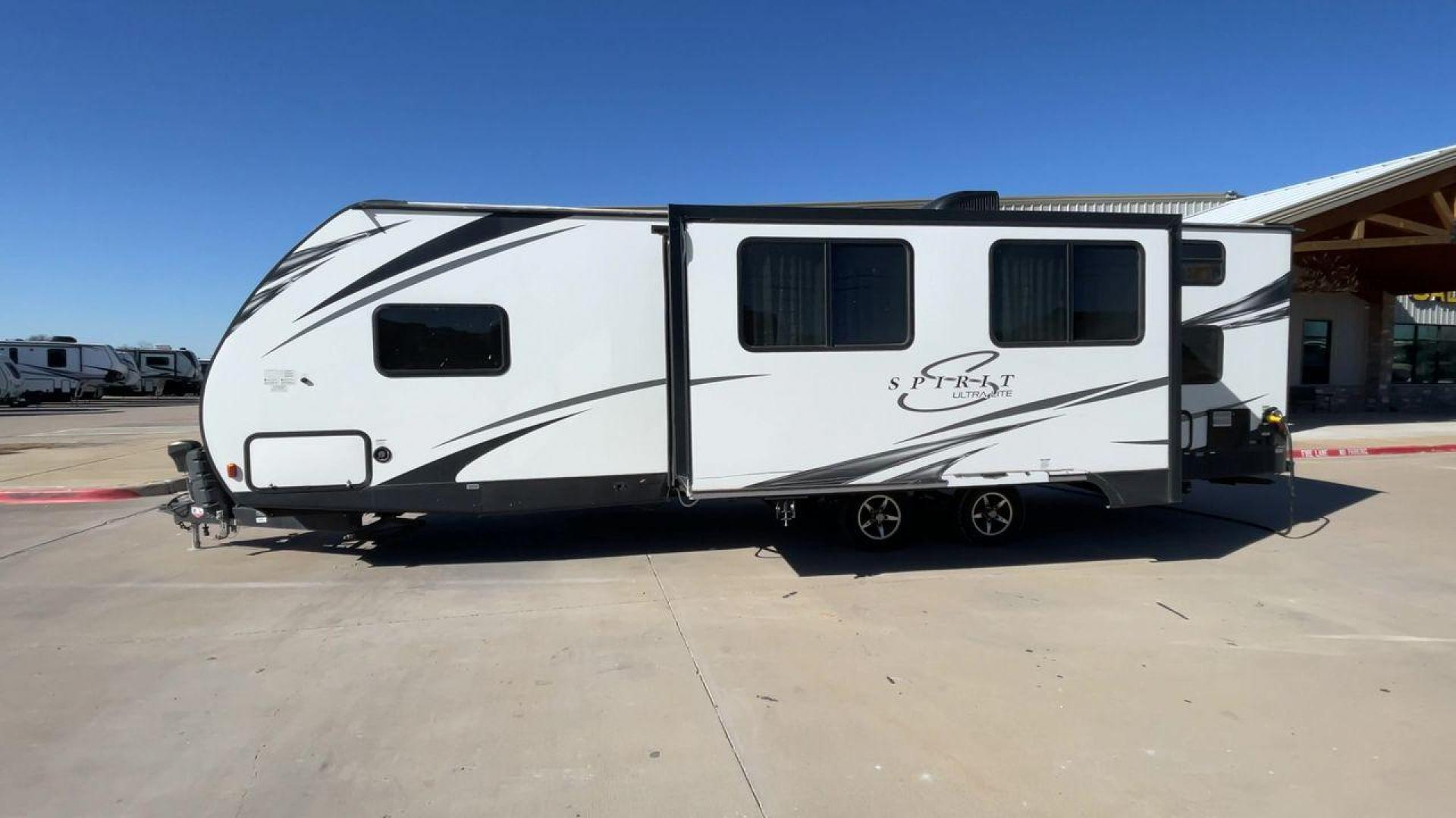 2019 FOREST RIVER SPIRIT 2963BH (5ZT2SBVB9KS) , Length: 33.92 ft. | Dry Weight: 6,408 lbs. | Slides: 1 transmission, located at 4319 N Main Street, Cleburne, TX, 76033, (817) 221-0660, 32.435829, -97.384178 - This 2019 Forest River Spirit 2963BH is a dual-axle aluminum wheel setup measuring just under 34 feet long. It has a dry weight of 6,408 lbs. and a payload capacity of 1,192 lbs. It also has a manageable hitch weight of 760 lbs. It features two doors and one slide. This travel trailer offers sleepin - Photo#6