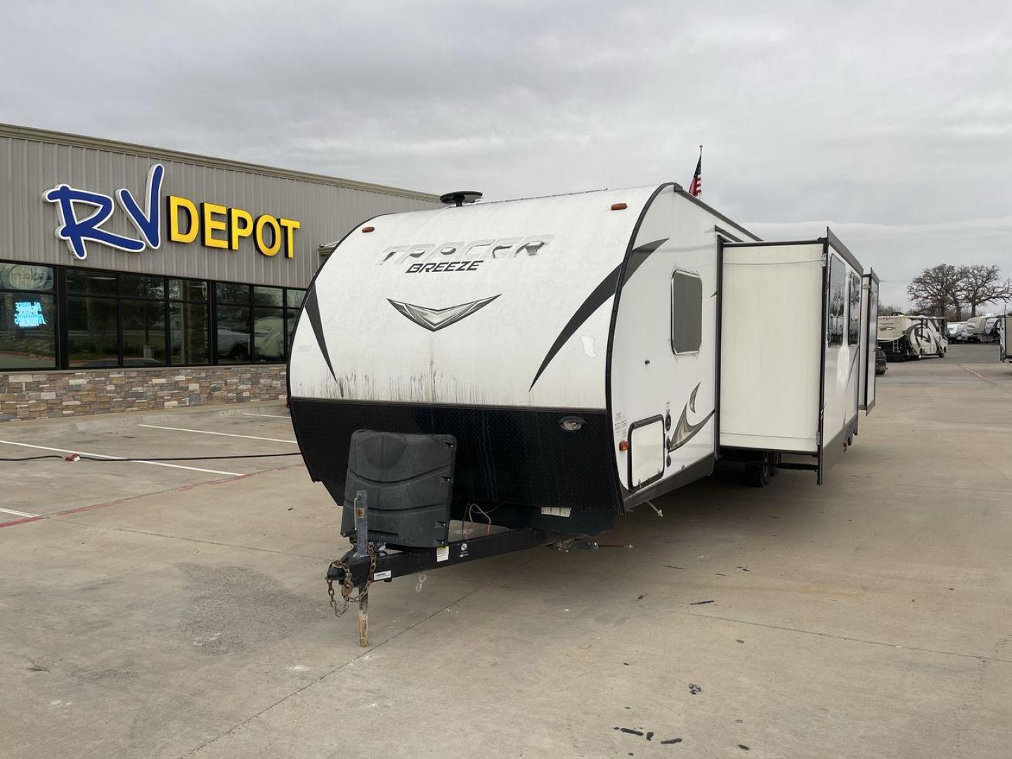 2019 WHITE FOREST RIVER TRACER 31BHD (5ZT2TRWB2KB) , Length: 34.5 ft. | Dry Weight: 6,300 lbs. | Slides: 2 transmission, located at 4319 N Main Street, Cleburne, TX, 76033, (817) 221-0660, 32.435829, -97.384178 - The 2019 Forest River Tracer 31BHD is a travel trailer designed for families who prioritize comfort, functionality, and adventure. The rear section is dedicated to a comfortable bunkhouse with multiple sleeping arrangements, providing a private and entertaining space for children or guests. Measurin - Photo#0