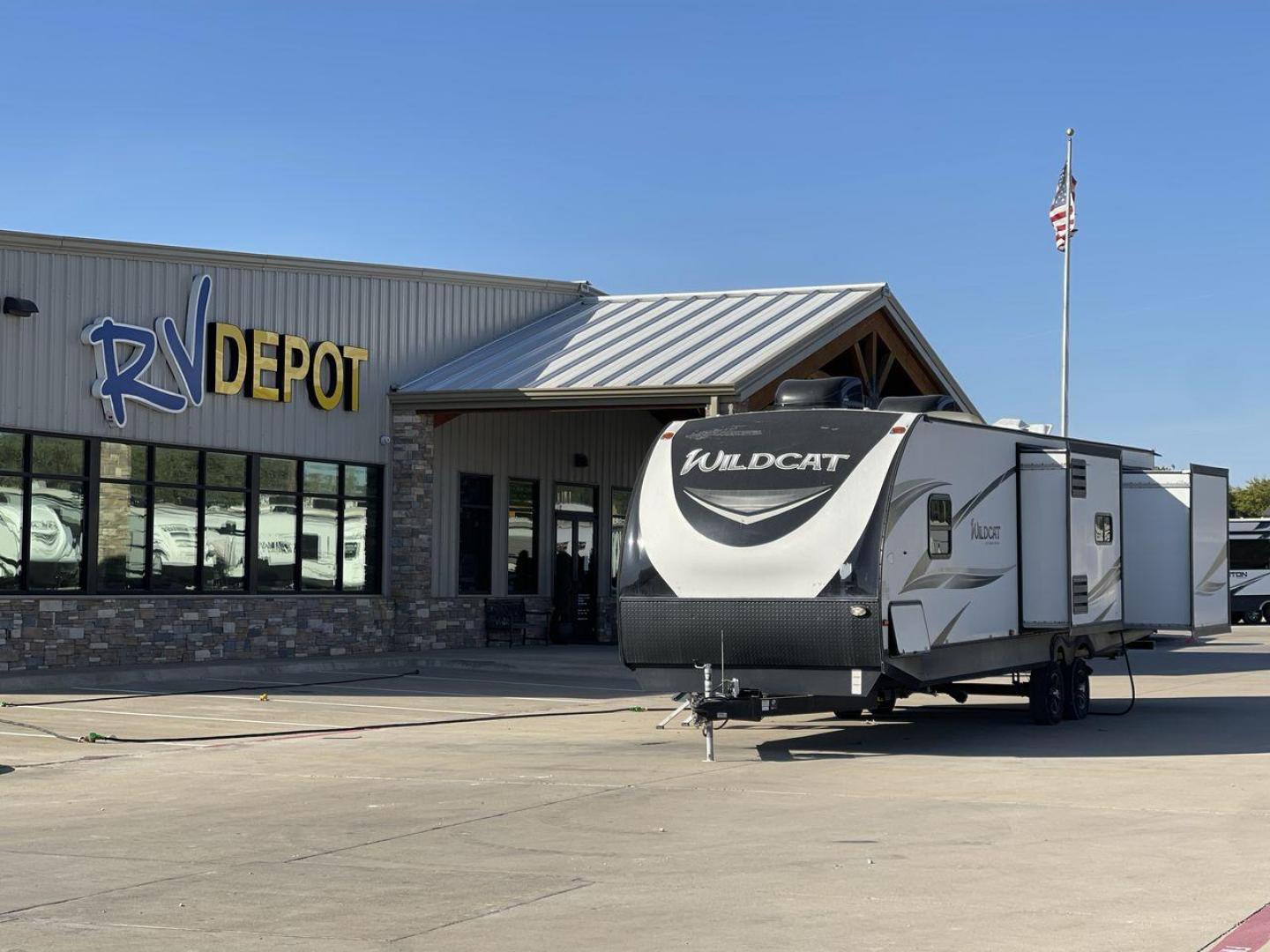 2019 WHITE FOREST RIVER WILDCAT 343BIK (5ZT2WCZB1KB) , Length: 37.42 ft. | Dry Weight: 8,226 lbs. | Slides: 3 transmission, located at 4319 N Main Street, Cleburne, TX, 76033, (817) 221-0660, 32.435829, -97.384178 - The 2019 Forest River Wildcat 343BIK is a triple slide travel trailer that measures 37.42 ft. in length. It has a dry weight of 8,226 lbs. and a payload capacity of 3,002 lbs. It is made of aluminum and fiberglass. It comes with automatic heating and cooling rated at 30,000 and 15,000 BTUs respectiv - Photo#0