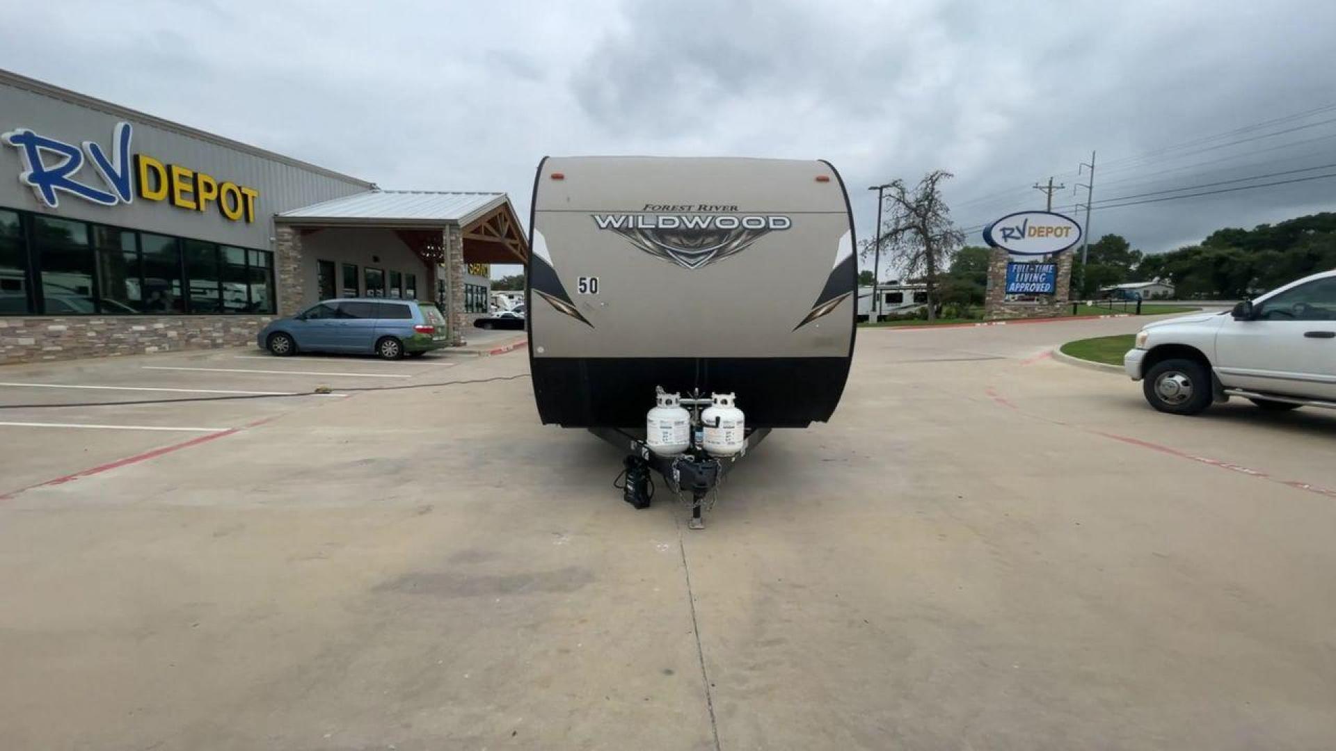 2019 FOREST RIVER WILDWOOD 28RLSS (4X4TWDD27KA) , Length: 34.75 ft. | Dry Weight: 7,075 lbs. | Slides: 1 transmission, located at 4319 N Main Street, Cleburne, TX, 76033, (817) 221-0660, 32.435829, -97.384178 - This 2019 Forest River Wildwood 28RLSS is a dual-axle steel wheel setup measuring 34.75 ft. long and 11.25 ft. tall. It has a dry weight of 7,075 lbs. and a payload capacity of 2,913 lbs. It includes one slide as well as one awning. This travel trailer features a spacious combined living and kitc - Photo#4