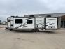 2019 FOREST RIVER WINDJAMMER 3008V (4X4TRLF24K1) , Length: 34 ft | Dry Weight: 7,433 lbs | Slides: 2 transmission, located at 4319 N Main Street, Cleburne, TX, 76033, (817) 221-0660, 32.435829, -97.384178 - Measuring 34 ft long, the 2019 Forest River Windjammer 3008V travel trailer is sleek and modern. The body features a white fiberglass surface accented with brown and black decals that provide a stylish and aerodynamic look. The front of the trailer is distinct with its pointed V-nose design. This en - Photo#23