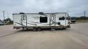 2019 FOREST RIVER WINDJAMMER 3008V (4X4TRLF24K1) , Length: 34 ft | Dry Weight: 7,433 lbs | Slides: 2 transmission, located at 4319 N Main Street, Cleburne, TX, 76033, (817) 221-0660, 32.435829, -97.384178 - Measuring 34 ft long, the 2019 Forest River Windjammer 3008V travel trailer is sleek and modern. The body features a white fiberglass surface accented with brown and black decals that provide a stylish and aerodynamic look. The front of the trailer is distinct with its pointed V-nose design. This en - Photo#2