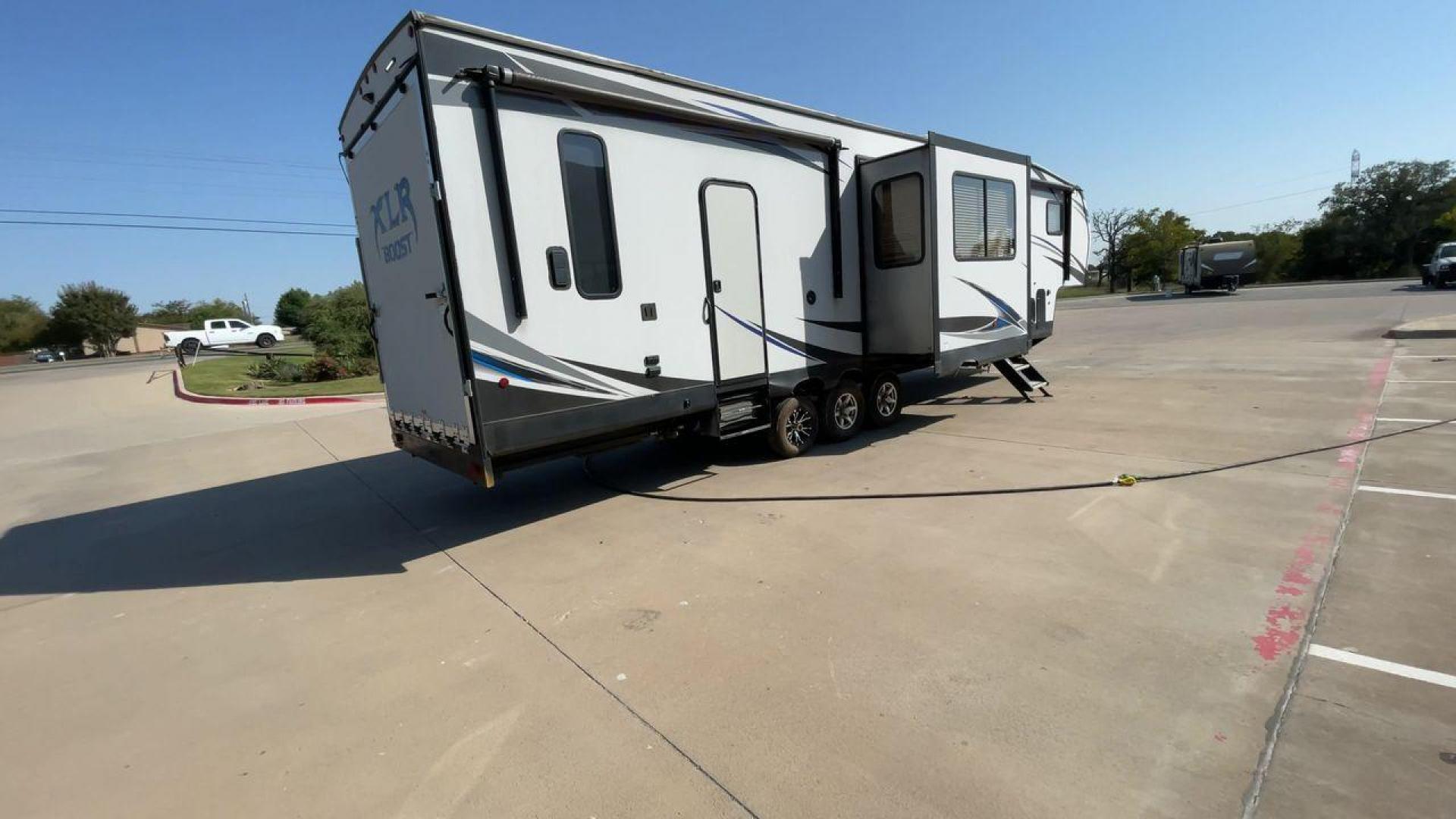 2019 FOREST RIVER XLR BOOST 37TSX13 (5ZT3XL2F9K1) , Length: 39.75 ft. | Dry Weight: 12,687 lbs. | Slides: 3 transmission, located at 4319 N Main Street, Cleburne, TX, 76033, (817) 221-0660, 32.435829, -97.384178 - Photo#1