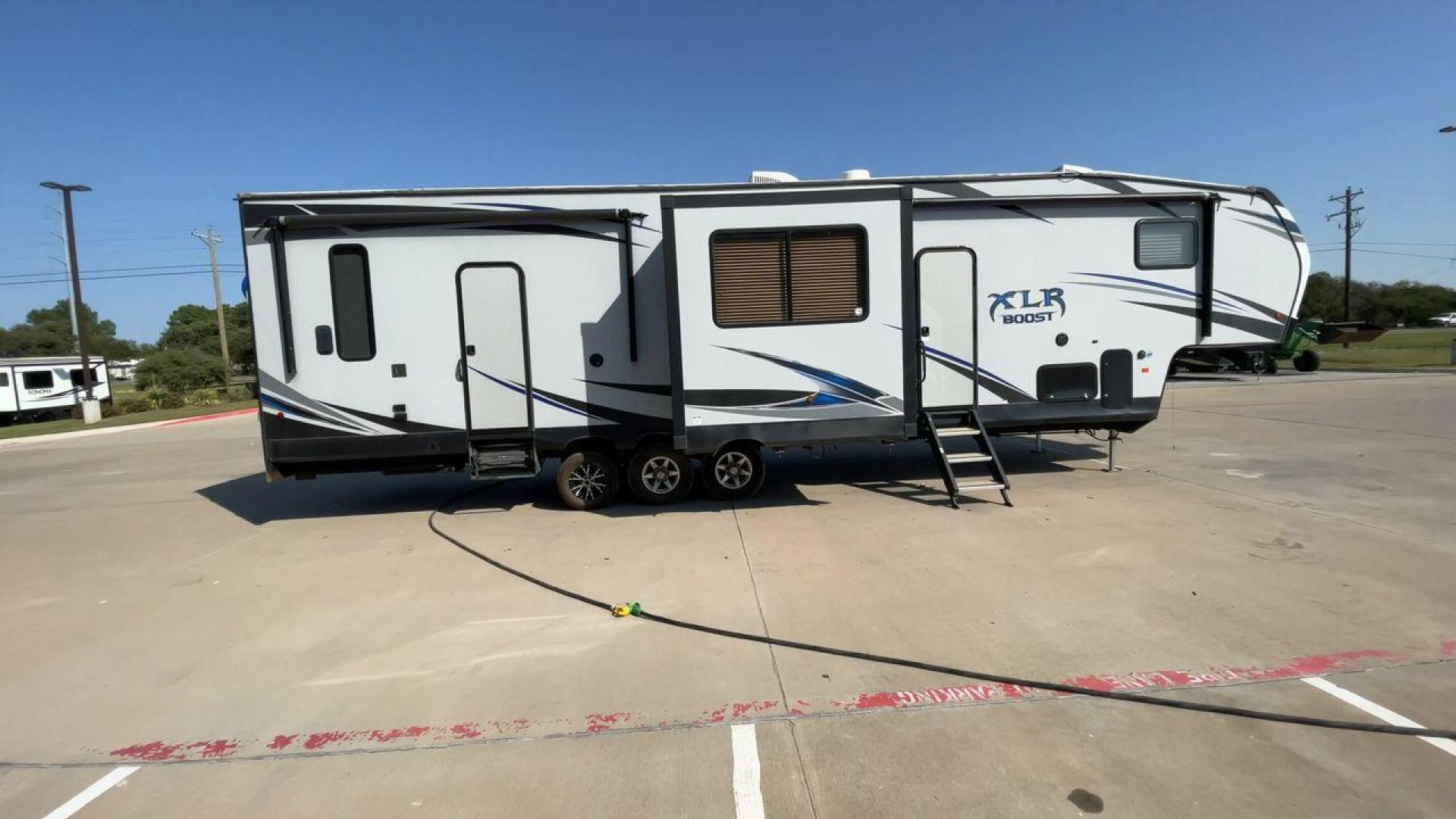 2019 FOREST RIVER XLR BOOST 37TSX13 (5ZT3XL2F9K1) , Length: 39.75 ft. | Dry Weight: 12,687 lbs. | Slides: 3 transmission, located at 4319 N Main Street, Cleburne, TX, 76033, (817) 221-0660, 32.435829, -97.384178 - Photo#2