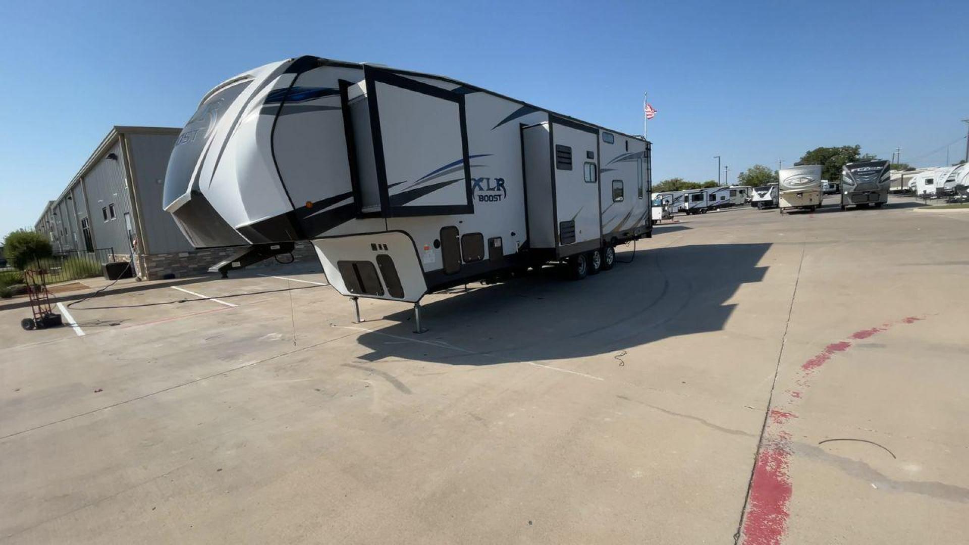 2019 FOREST RIVER XLR BOOST 37TSX13 (5ZT3XL2F9K1) , Length: 39.75 ft. | Dry Weight: 12,687 lbs. | Slides: 3 transmission, located at 4319 N Main Street, Cleburne, TX, 76033, (817) 221-0660, 32.435829, -97.384178 - Photo#5