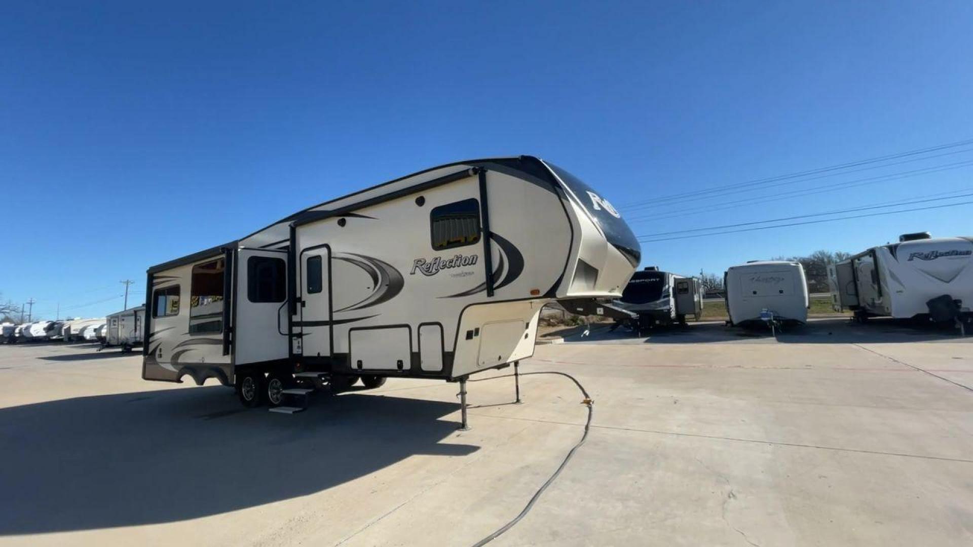 2019 GRAND DESIGN REFLECTION 303RLS (573FR3329K3) , Length: 32.42 ft| Dry Weight: 9,265 lbs. | Gross Weight: 11,995 lbs. | Slides: 3 transmission, located at 4319 N Main Street, Cleburne, TX, 76033, (817) 221-0660, 32.435829, -97.384178 - Experience the pinnacle of opulence and elegance with the 2019 Grand Design Reflection 303RLS, a fifth-wheel trailer that sets new benchmarks for luxurious RV living. This model boasts a generous 33-foot length, offering a roomy and thoughtfully crafted interior that creates the perfect atmosphere f - Photo#3